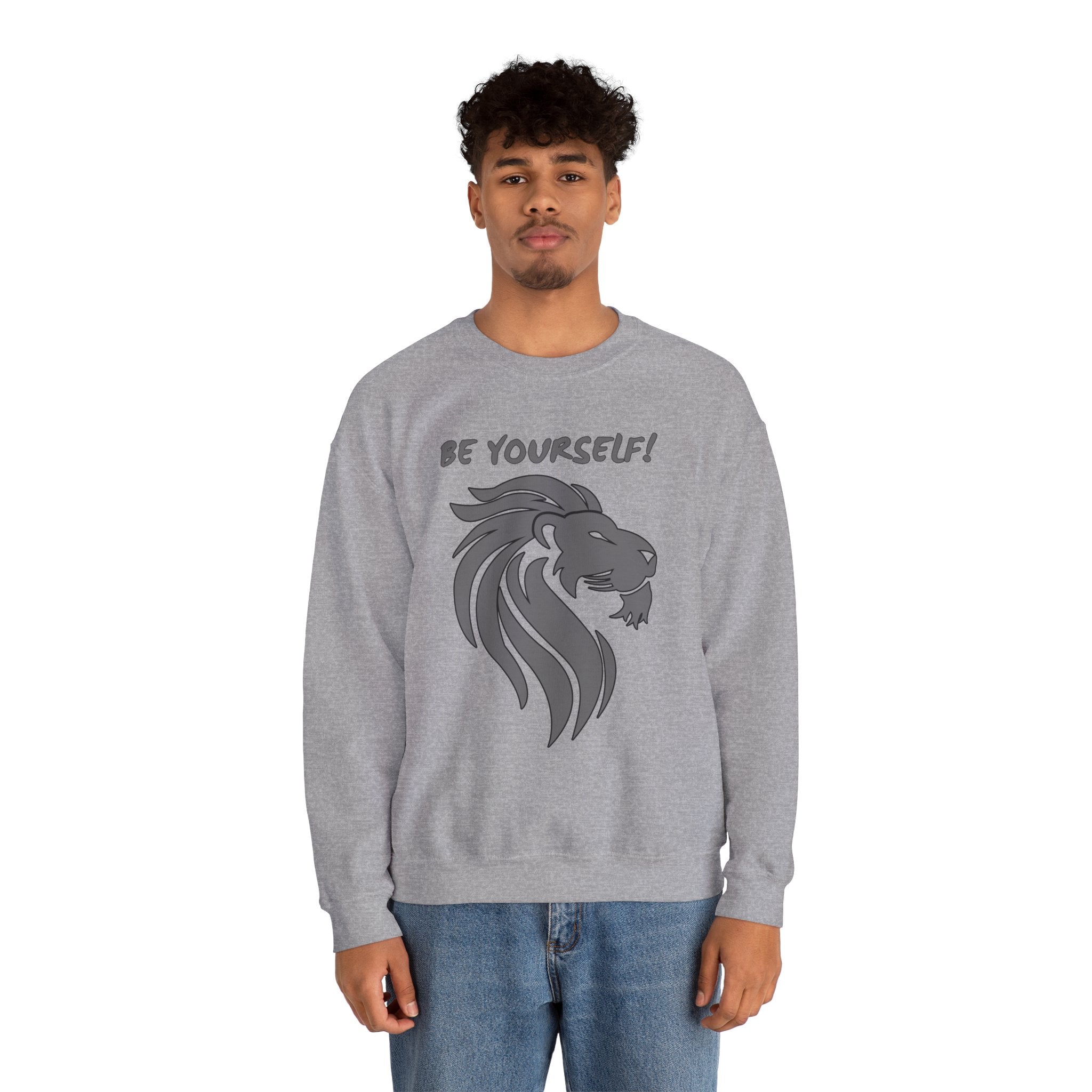Person wearing a gray sweatshirt with a lion graphic and 'Be Yourself!' text on a white background