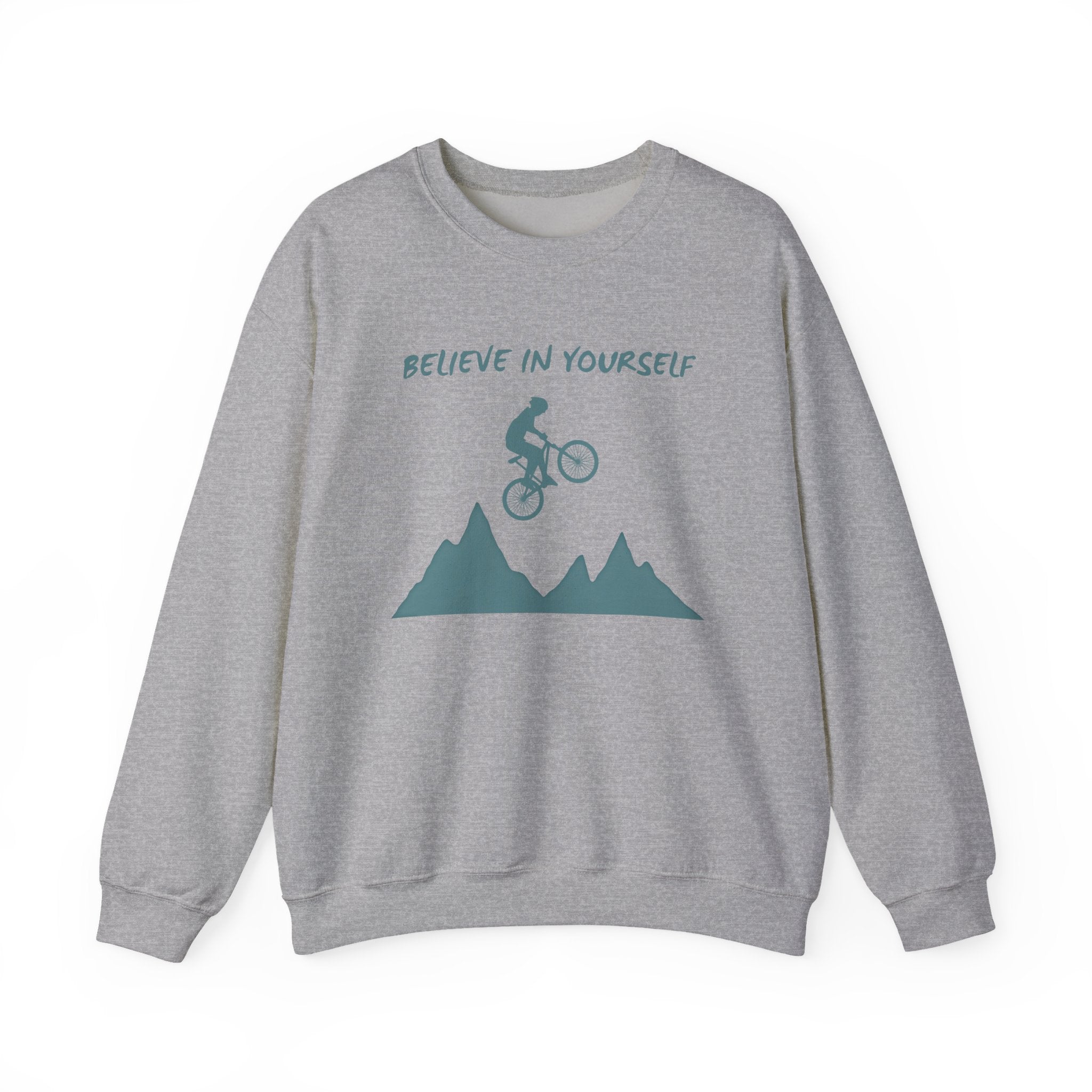 Gray sweatshirt with mountain and bicycle graphic and 'Believe in Yourself' text on a white background