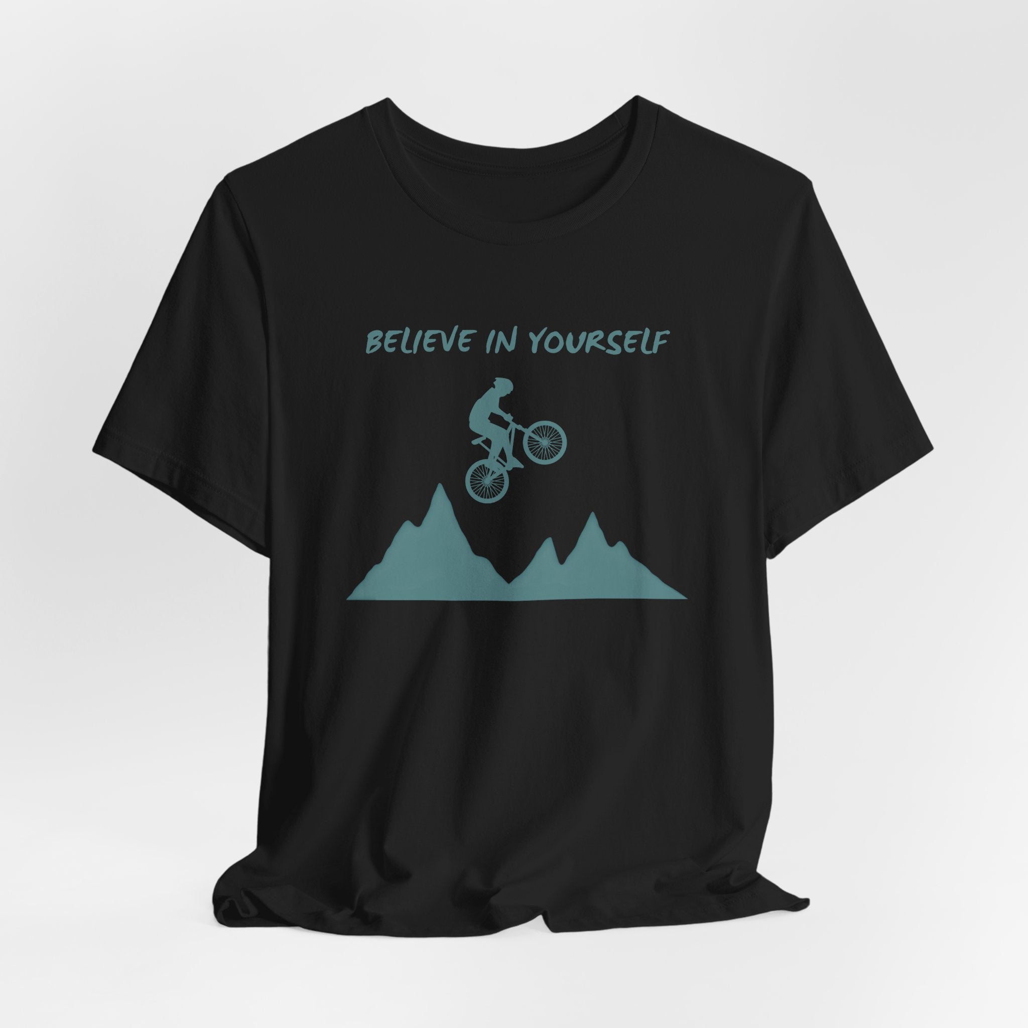 Black t-shirt with mountain bike graphic and 'Believe in Yourself' text on a white background