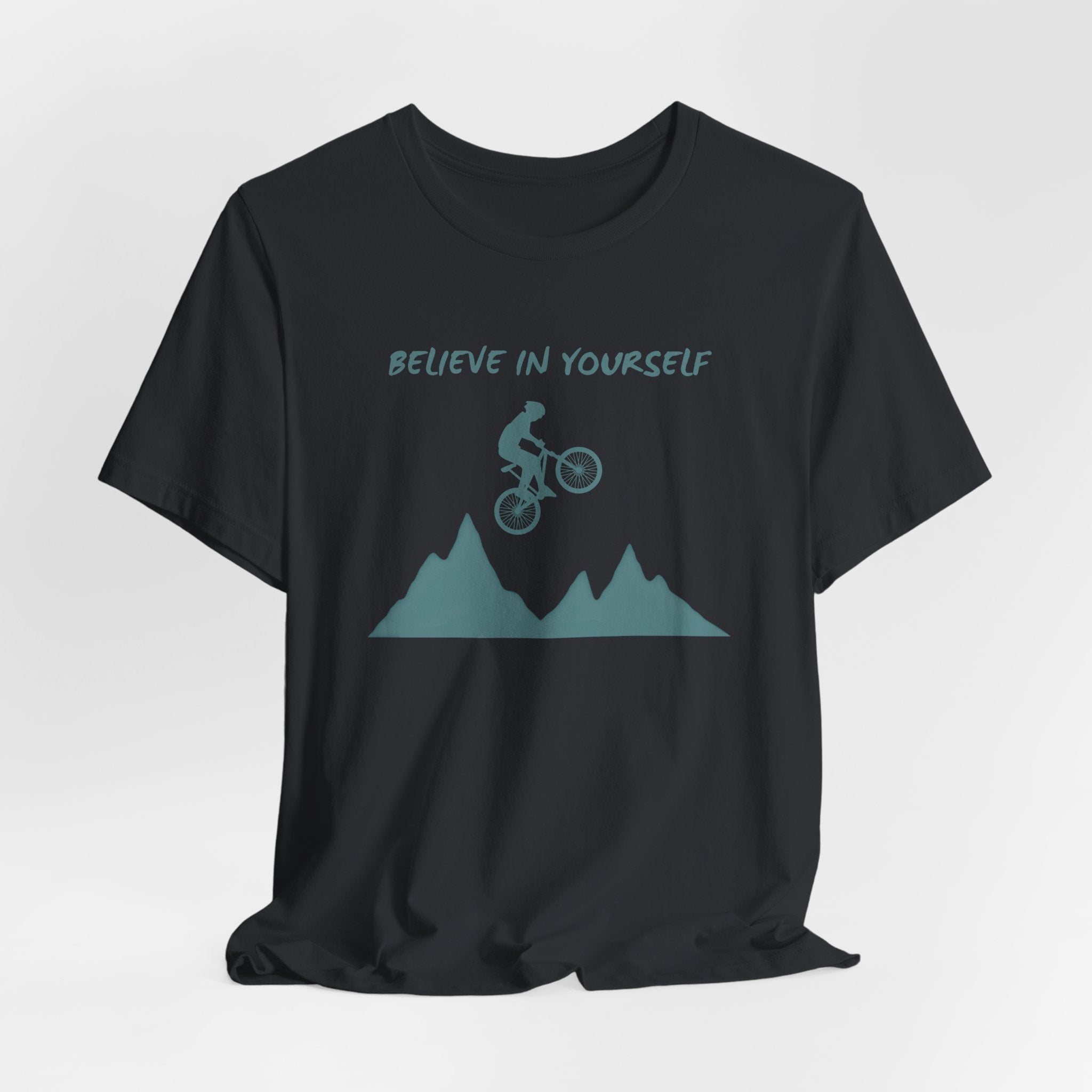 Vintage black t-shirt with mountain bike graphic and 'Believe in Yourself' text on a white background