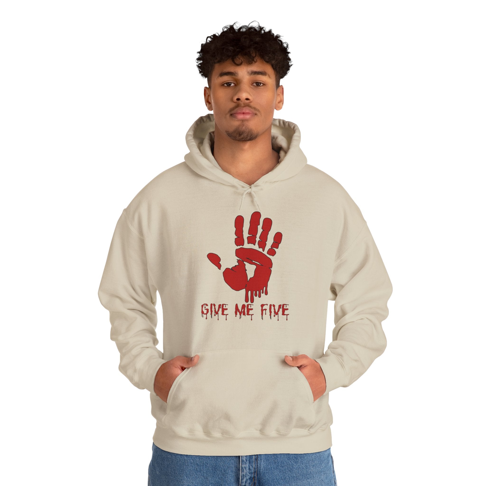 Person wearing a beige hoodie with a red handprint design and text on a white background