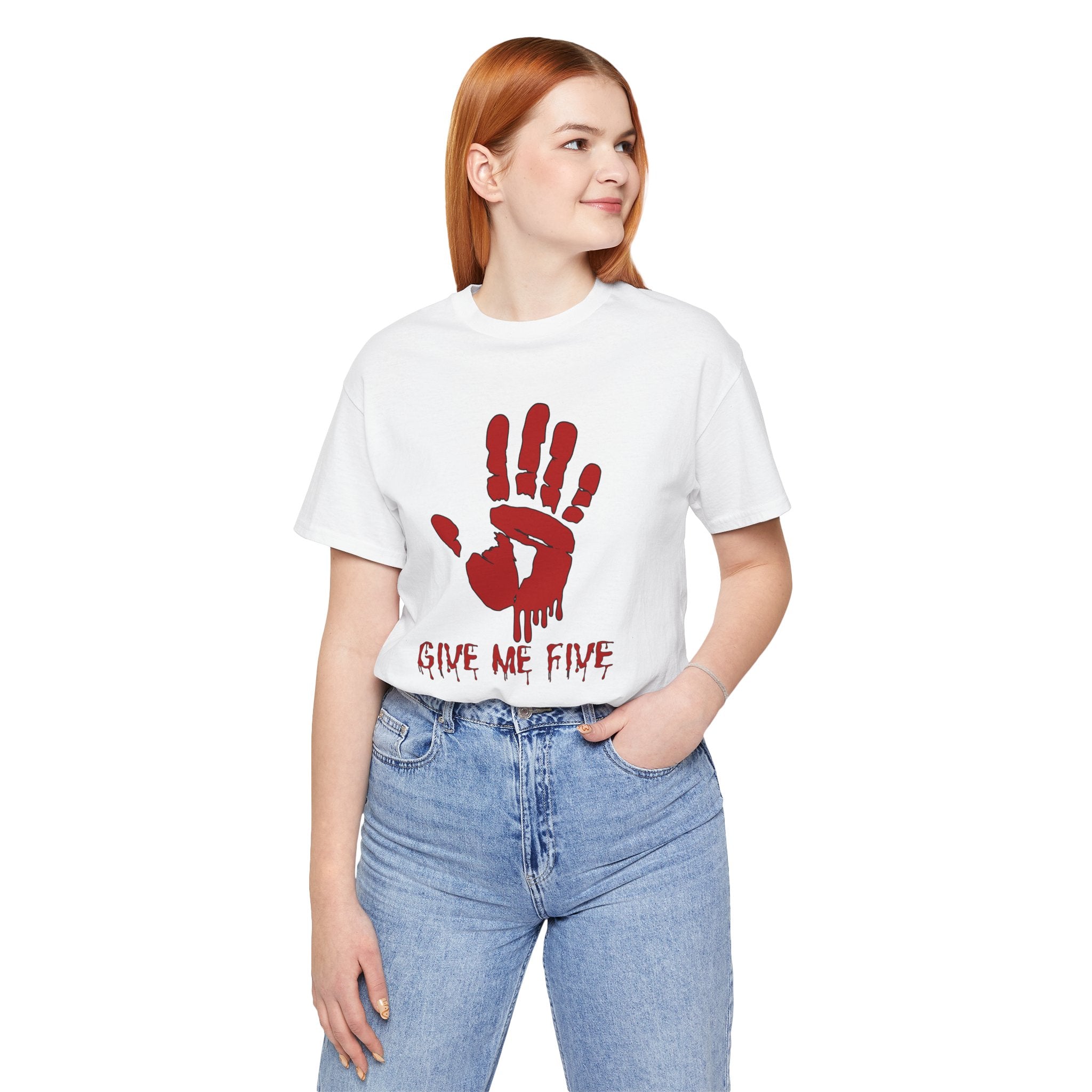 Person wearing a white t-shirt with a red handprint design and text on a white background