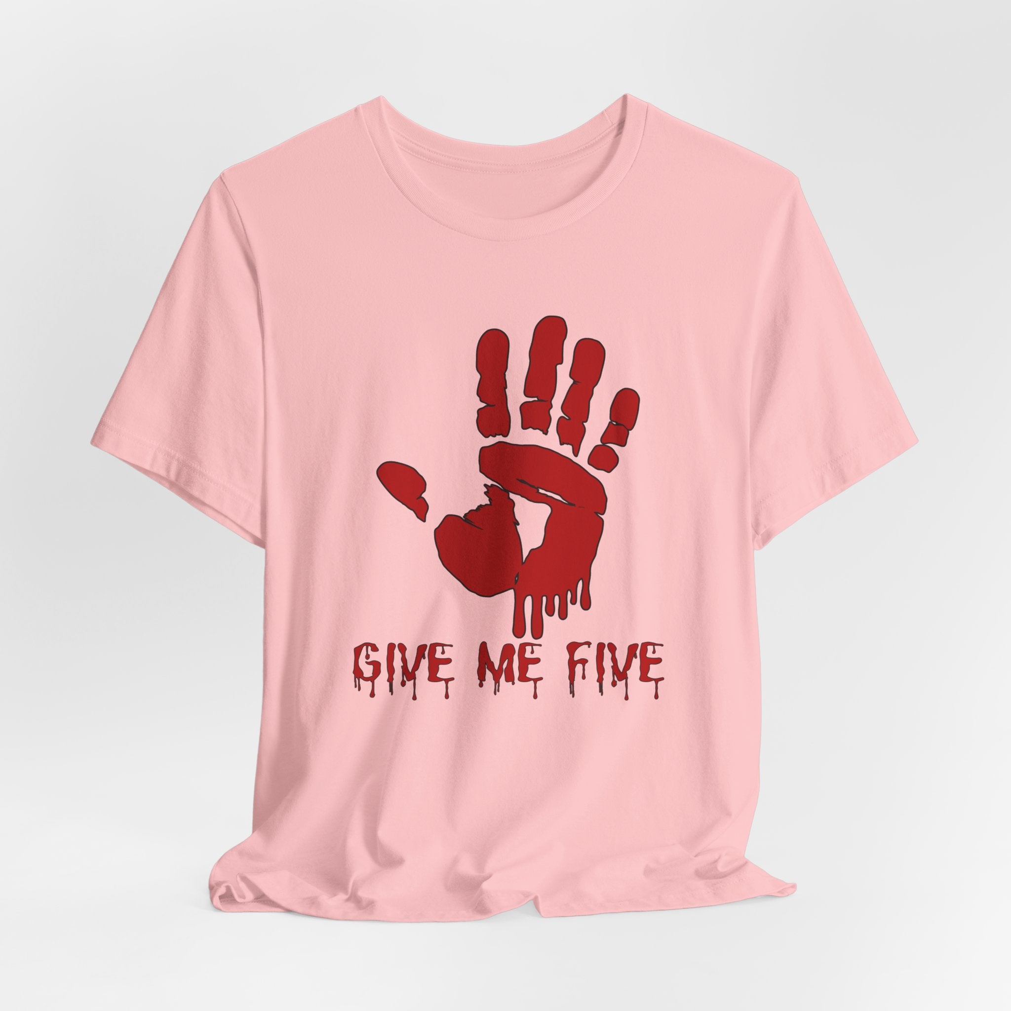 Pink t-shirt with red hand print and 'Give Me Five' text on a light gray background