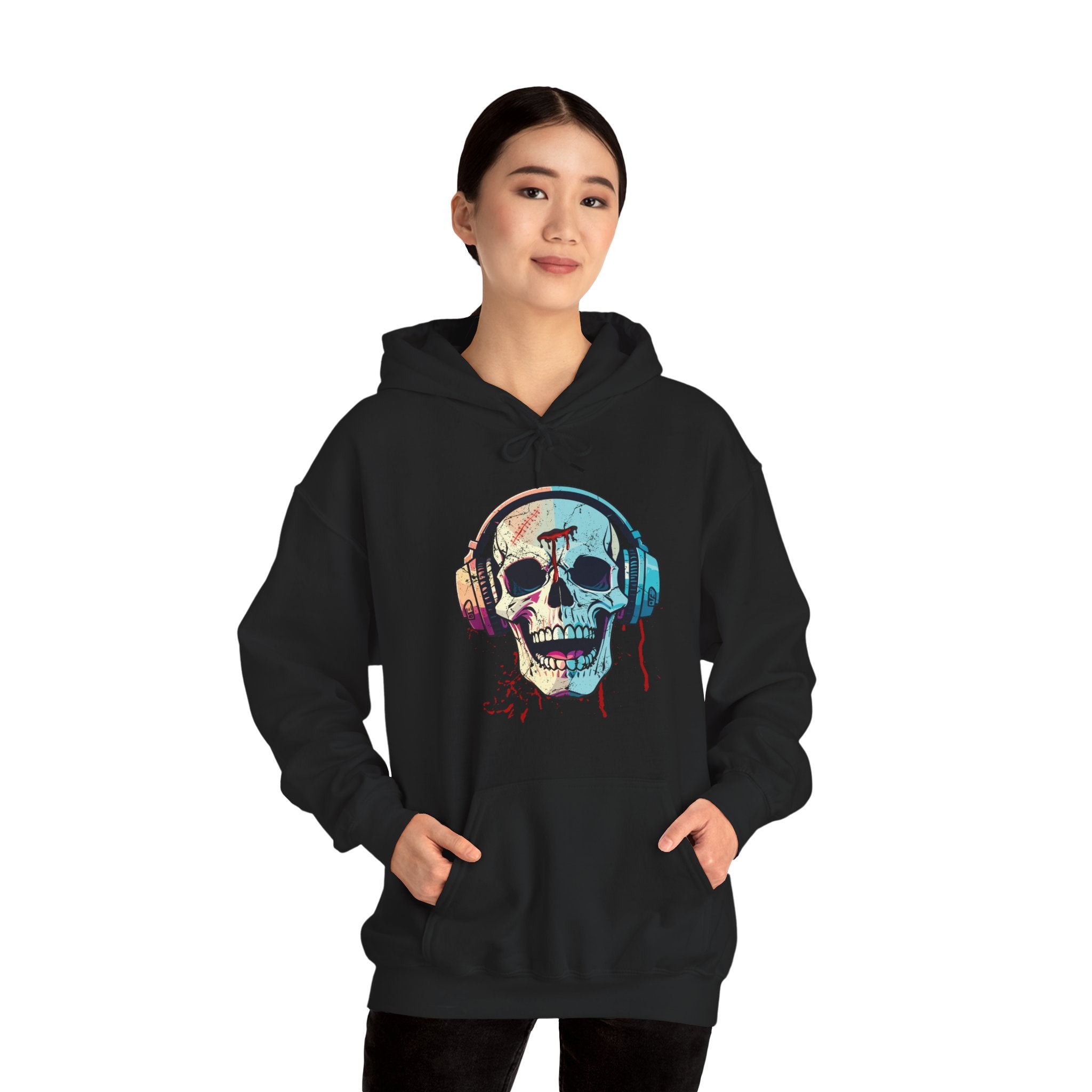 Person wearing a black hoodie with a colorful skull design on a white background