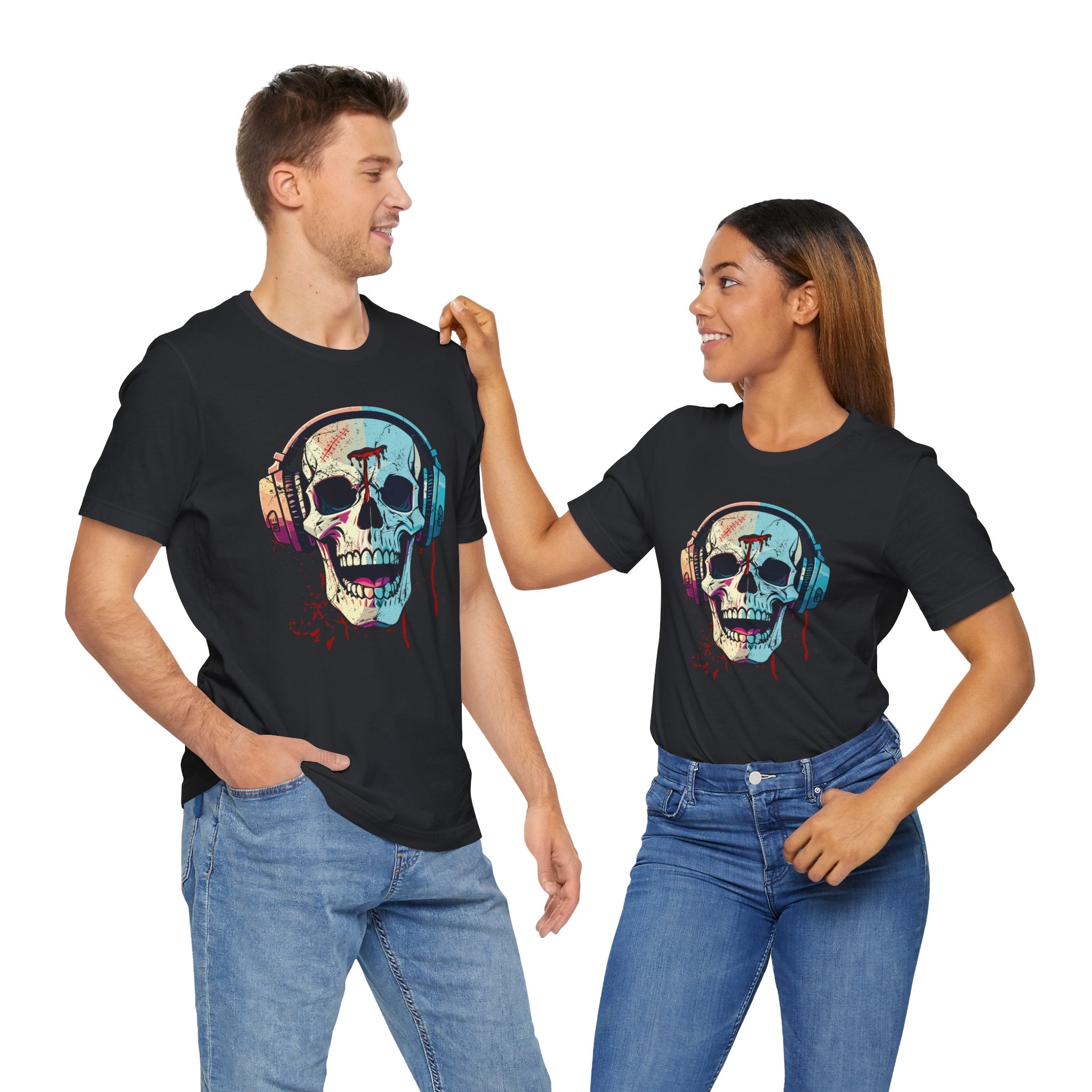 Two people wearing black t-shirts with a colorful skull design and headphones on a white background.