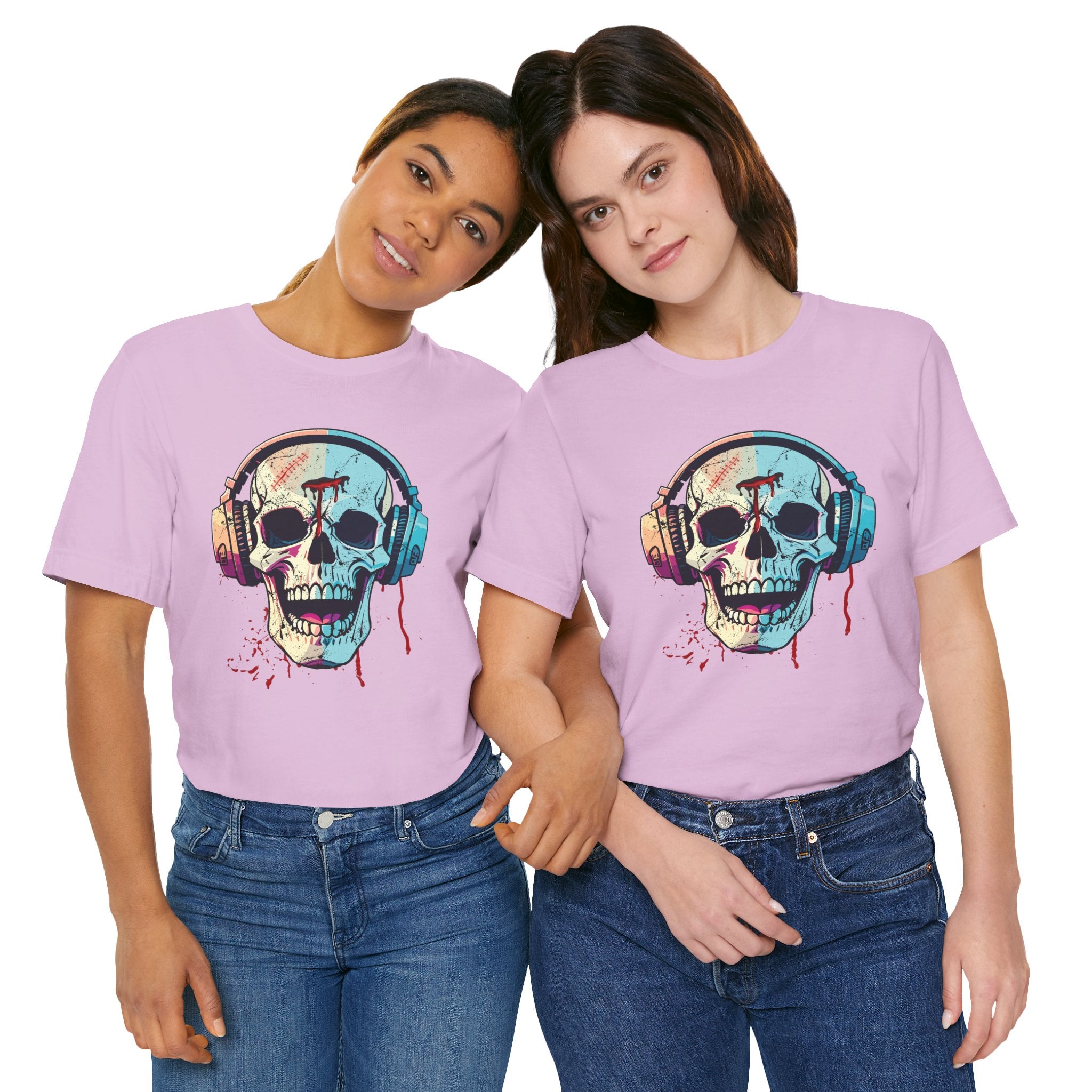 Two people wearing pink t-shirts with a colorful skull design and headphones.