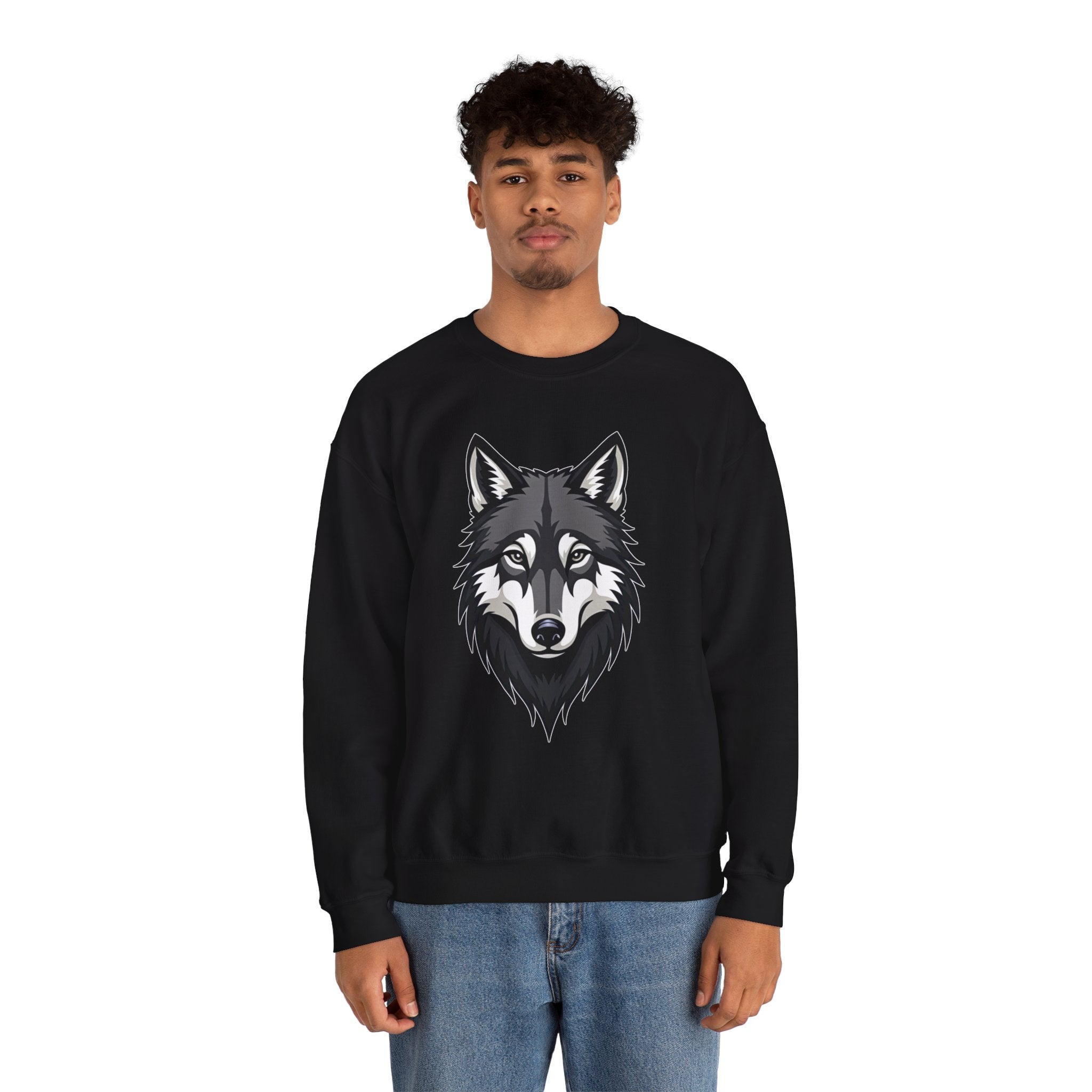 Person wearing a black sweatshirt with a wolf design on a white background