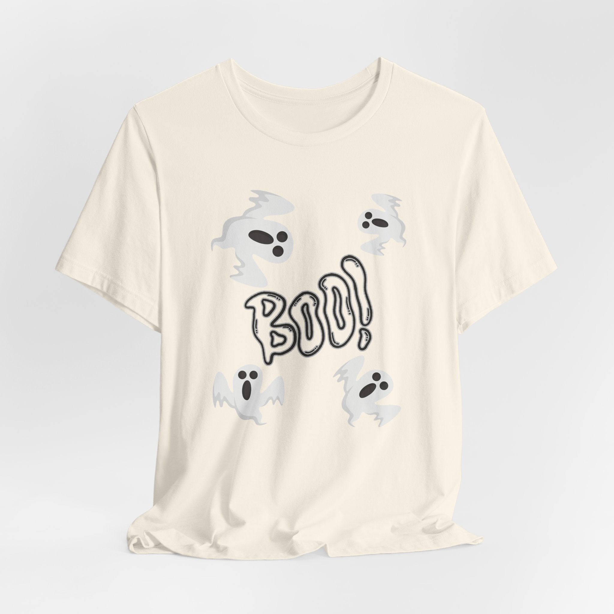 Natural beige t-shirt with 'BOO!' and ghost designs on a light gray background