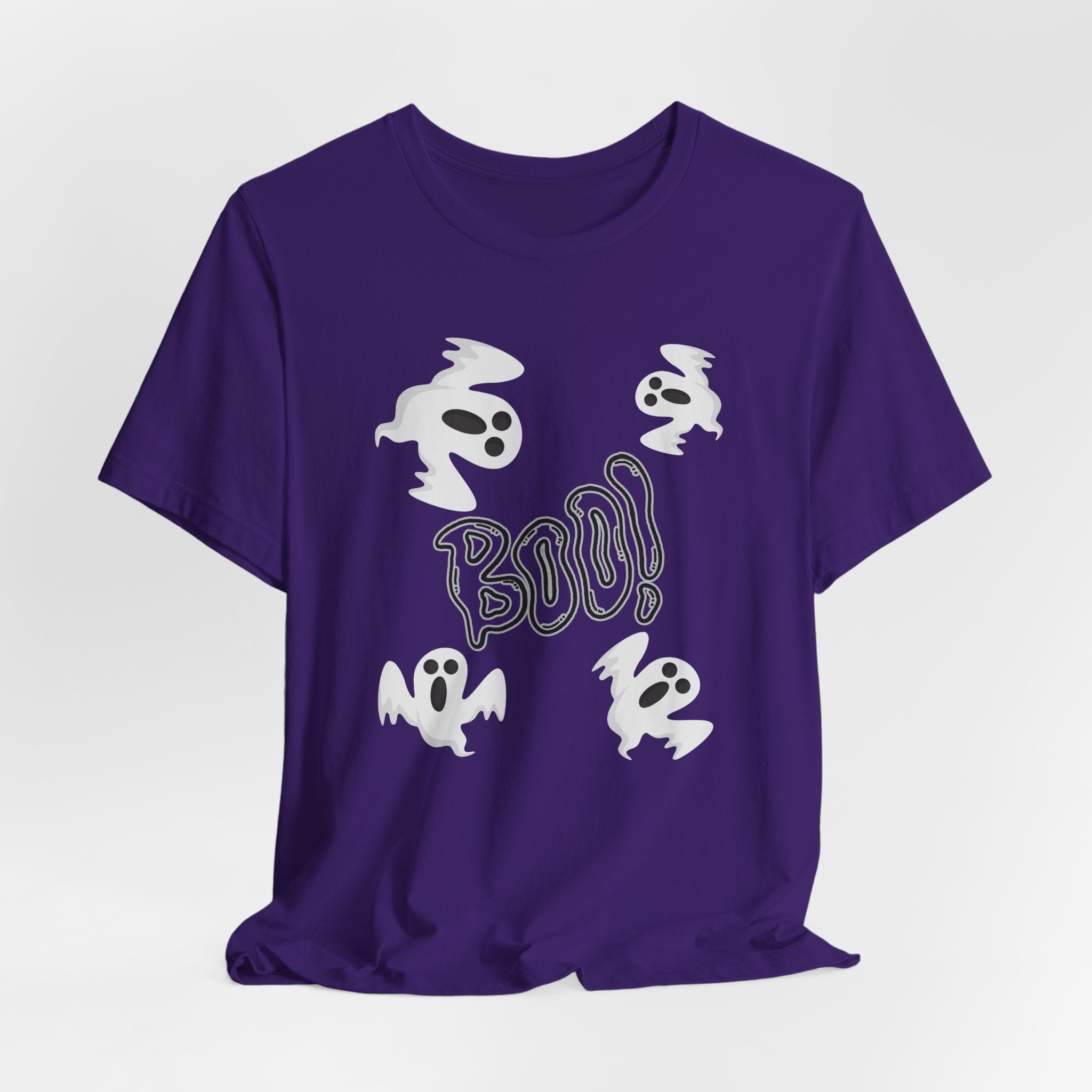 Purple t-shirt with Halloween-themed design featuring ghosts and 'BOO!' on a white background