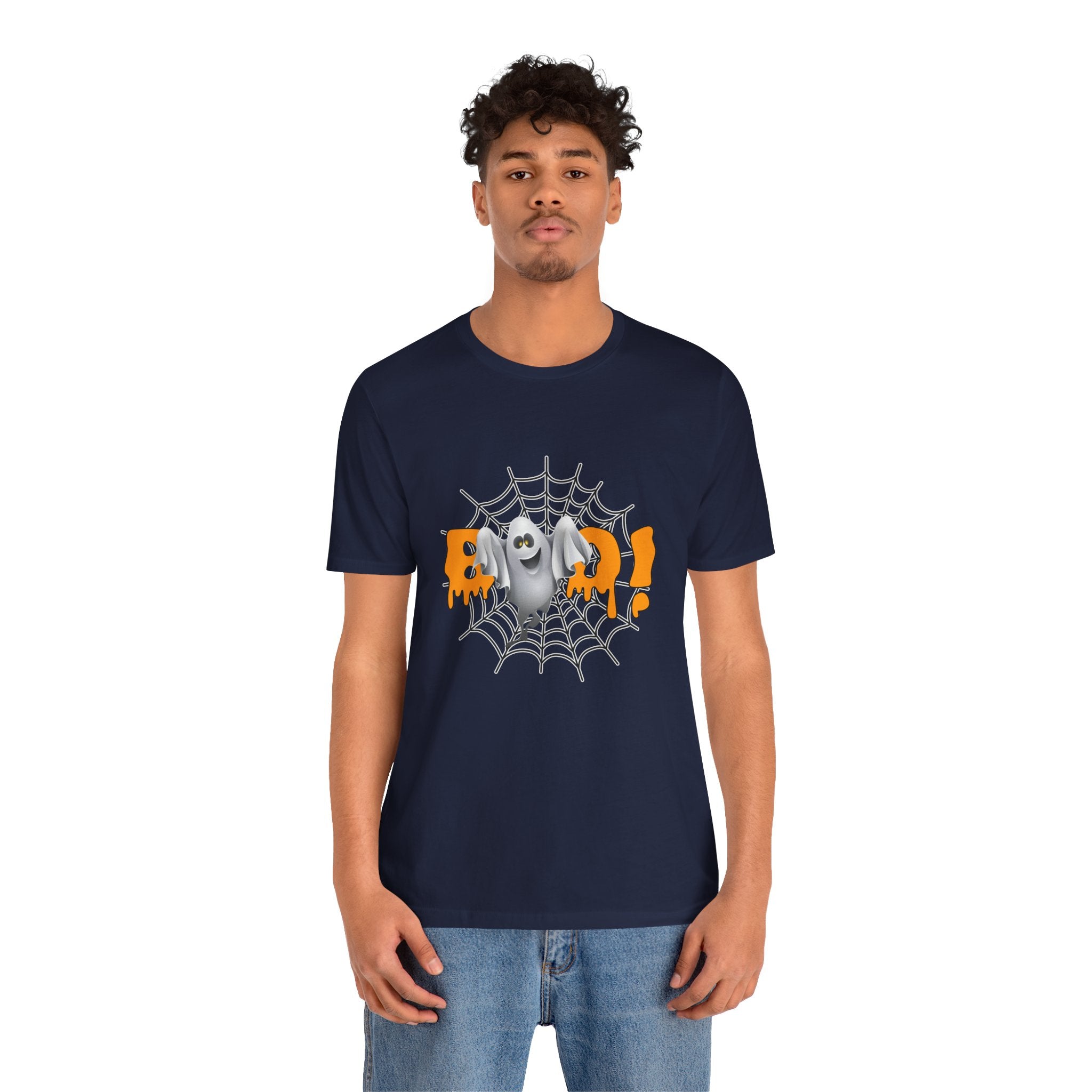 Person wearing a navy blue t-shirt with a Halloween-themed graphic design on a white background