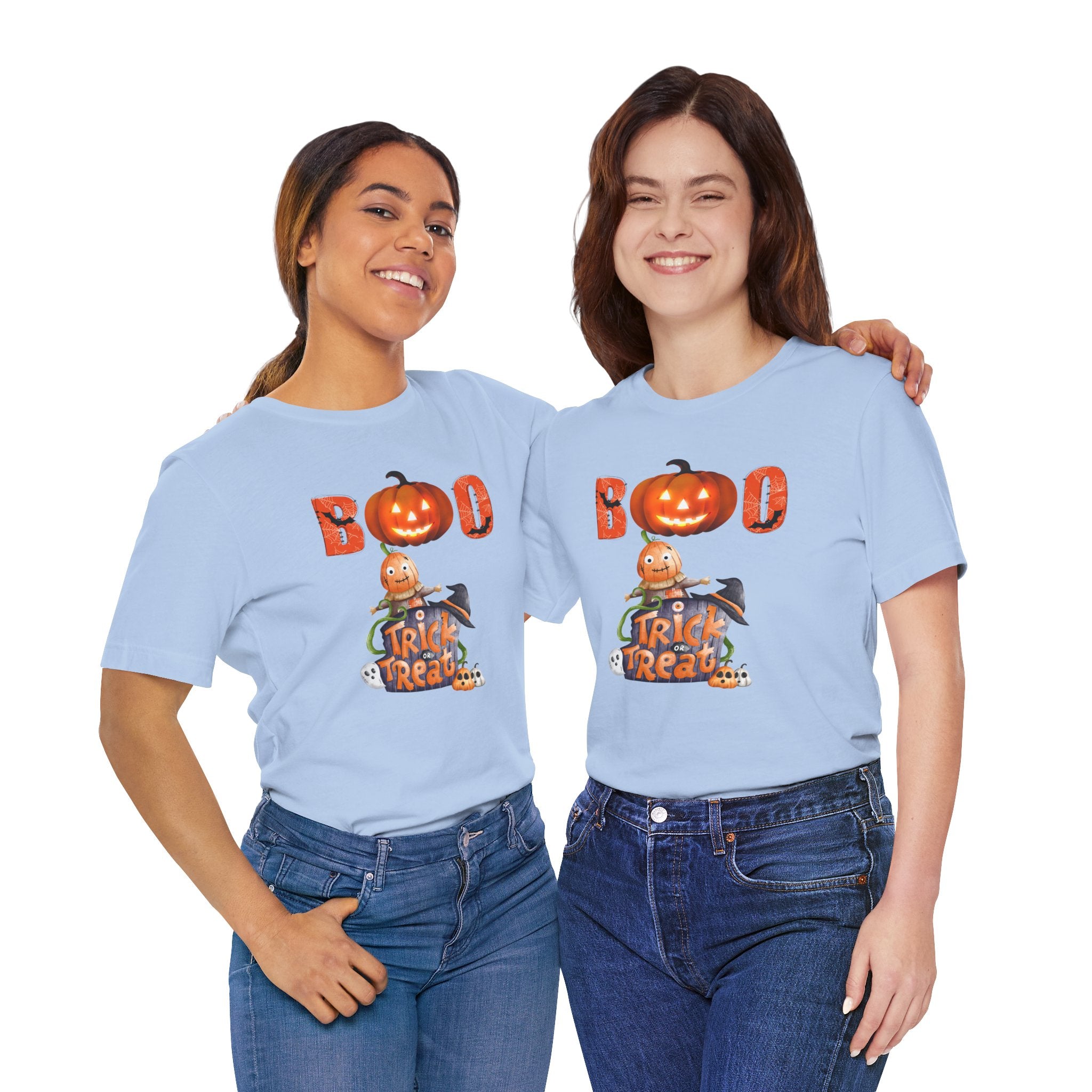 Two people wearing light blue t-shirts with Halloween-themed designs on a white background