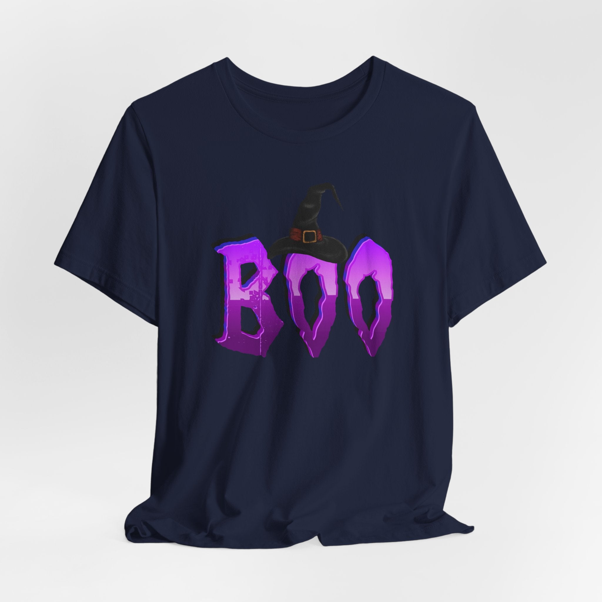 Navy blue t-shirt with purple 'BOO' text and witch hat graphic on a light gray background