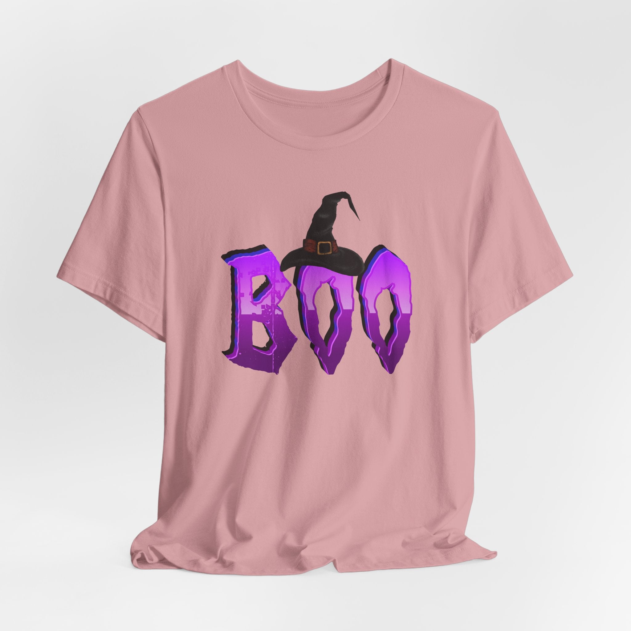 Orchid pink t-shirt with purple 'BOO' text and witch hat design on a light gray background