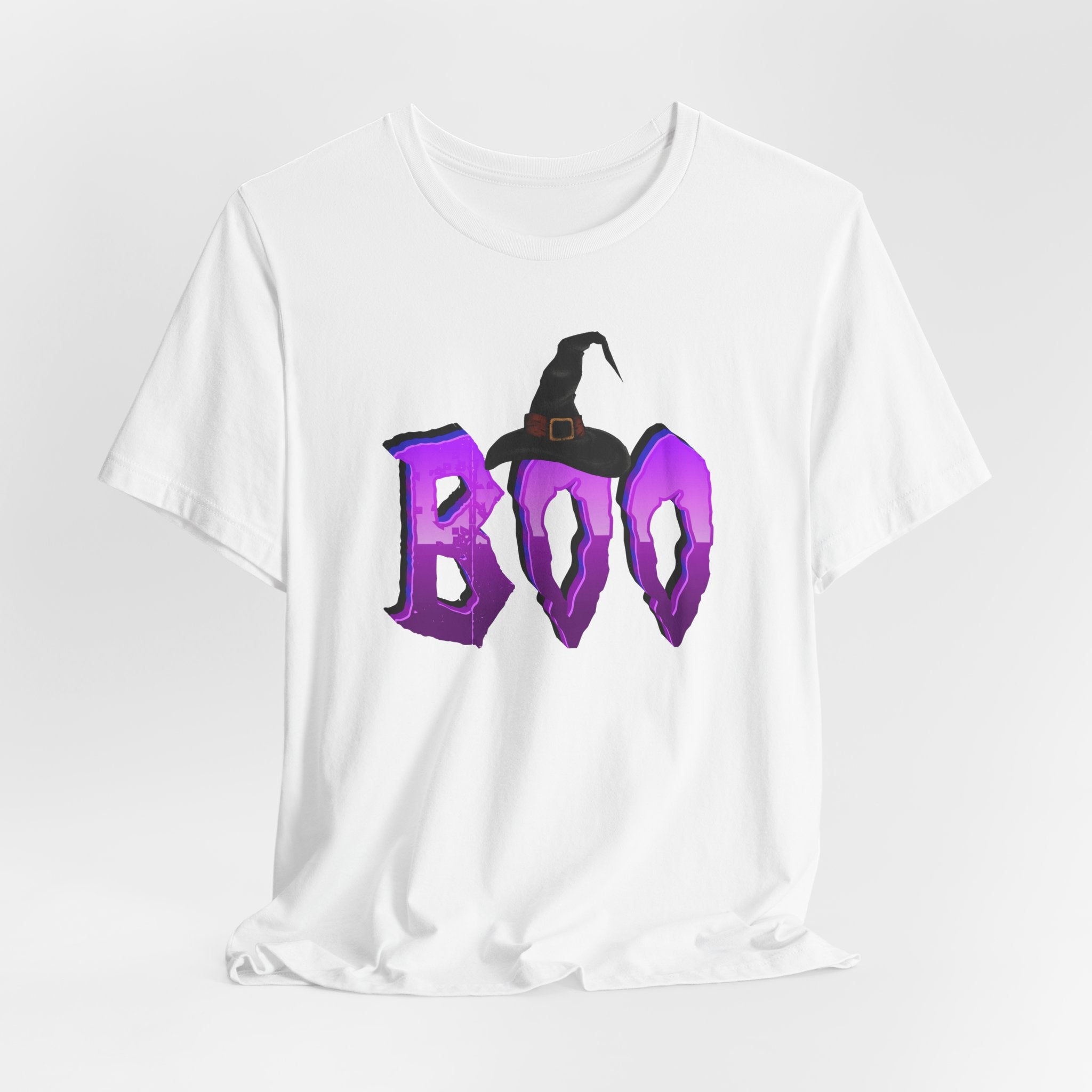 White t-shirt with 'BOO' in purple letters and a witch hat graphic on a white background