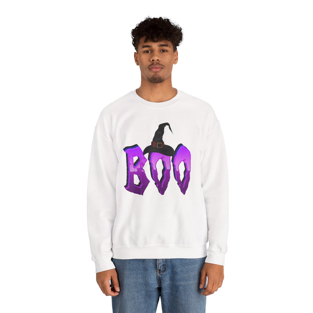 Person wearing a white sweatshirt with 'BOO' and a witch hat design on a white background