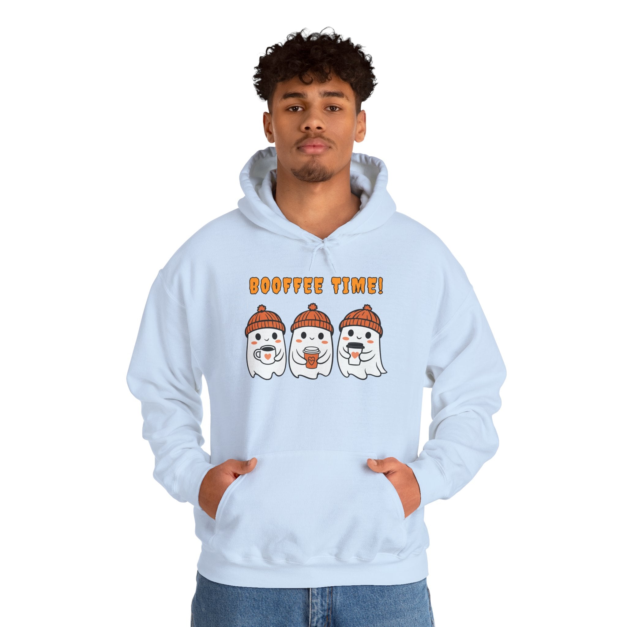 Person wearing a light blue hoodie with cartoon ghosts and 'Boo-ffee Time!' text on a white background