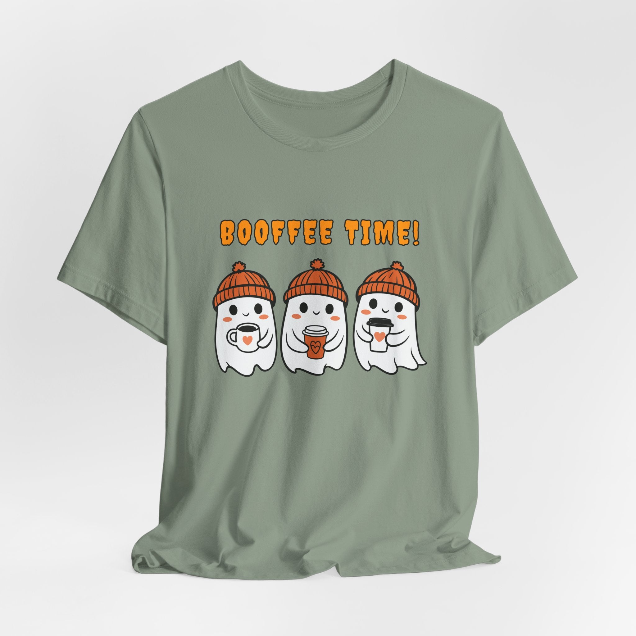 Sage green t-shirt with cartoon ghosts and 'BOOFFEE TIME!' text on a light gray background