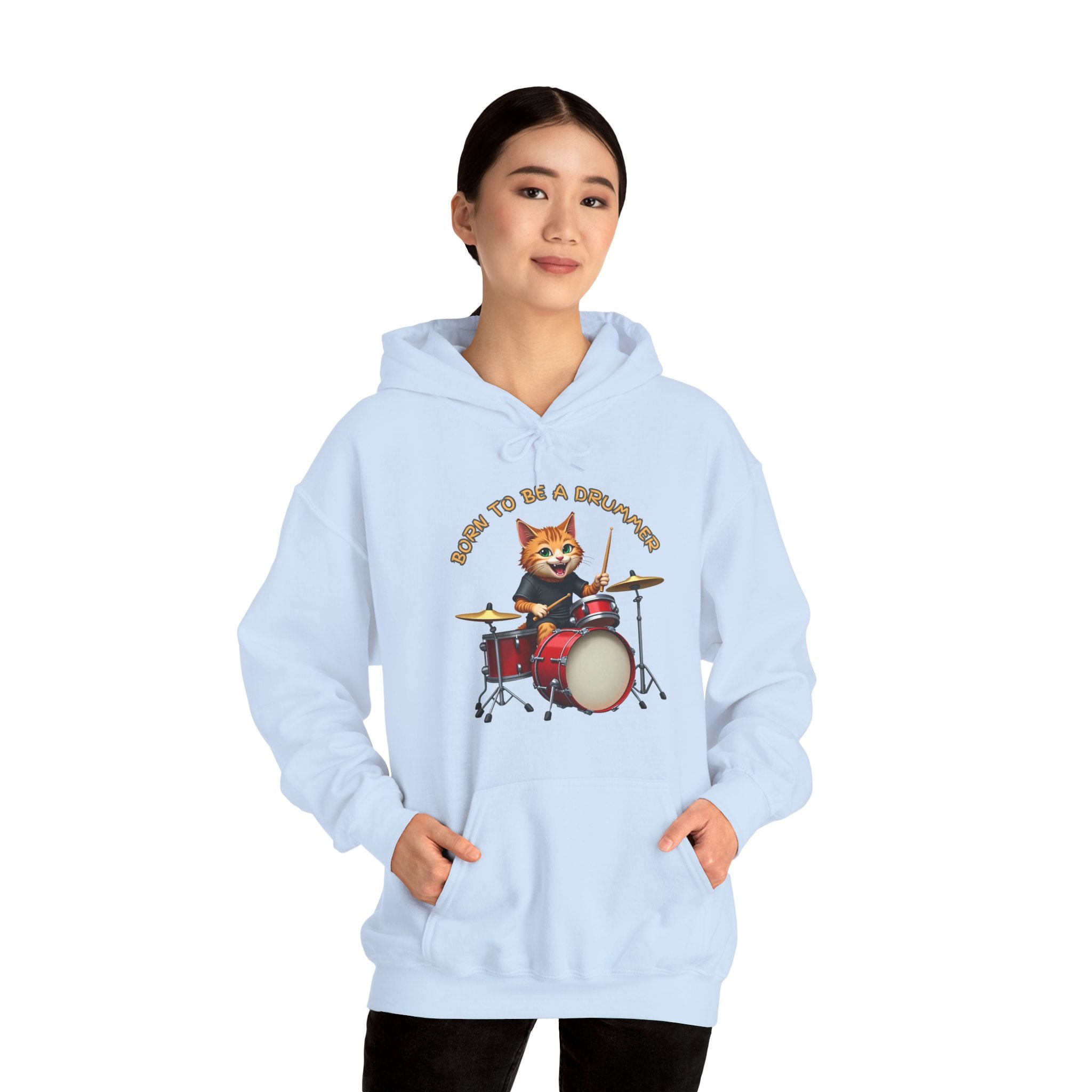 Light blue hoodie with a cat playing drums graphic and text on a white background