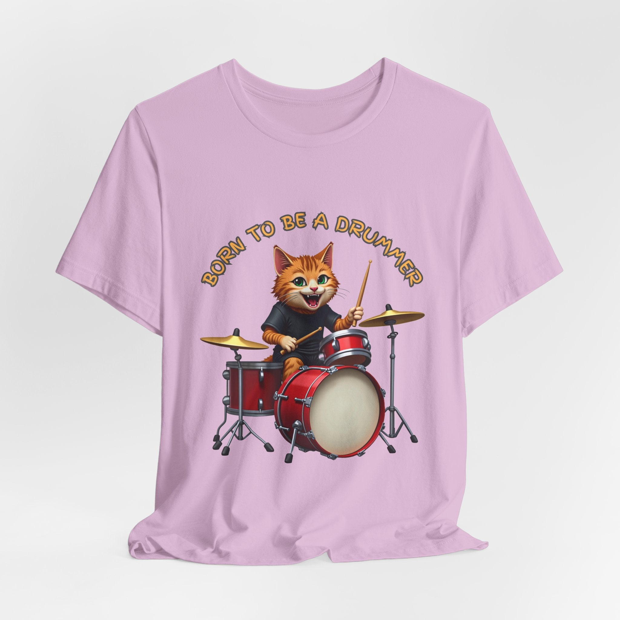 Lilac pink t-shirt with a cartoon cat playing drums and 'Born to be a Drummer' text on a white background
