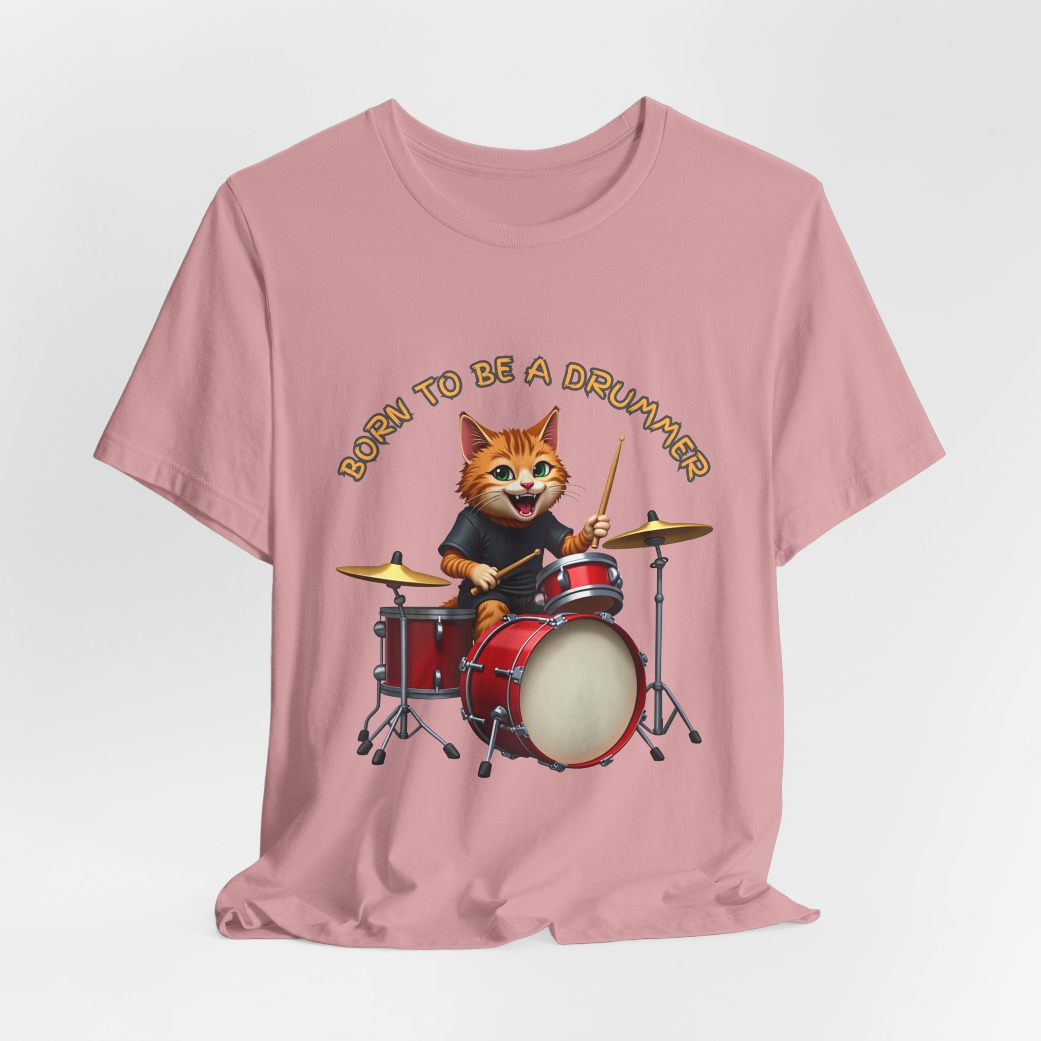 Orchid pink t-shirt with a cartoon cat playing drums and 'Born to be a Drummer' text on a white background