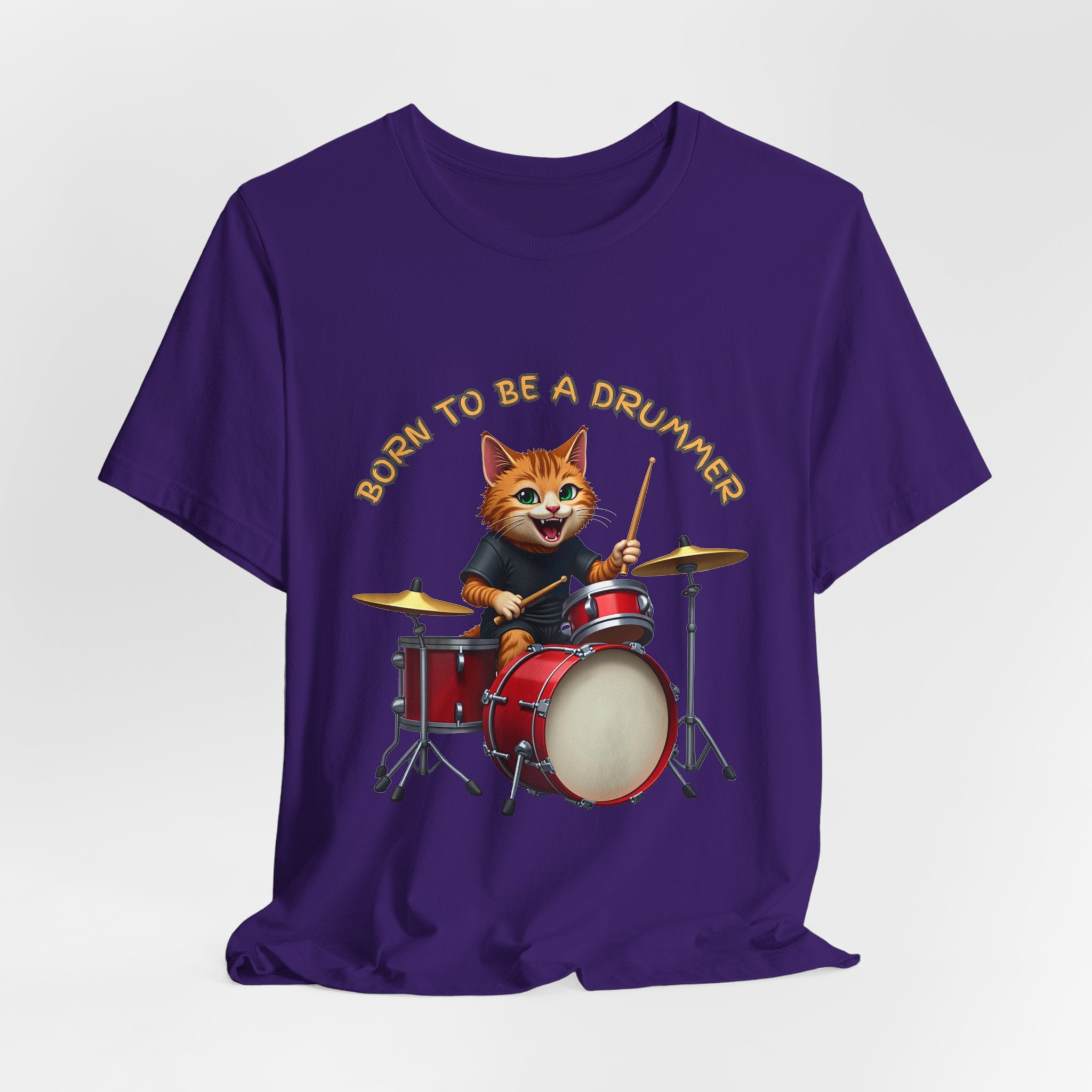 Purple t-shirt with a cartoon cat playing drums and 'Born to be a Drummer' text on a white background