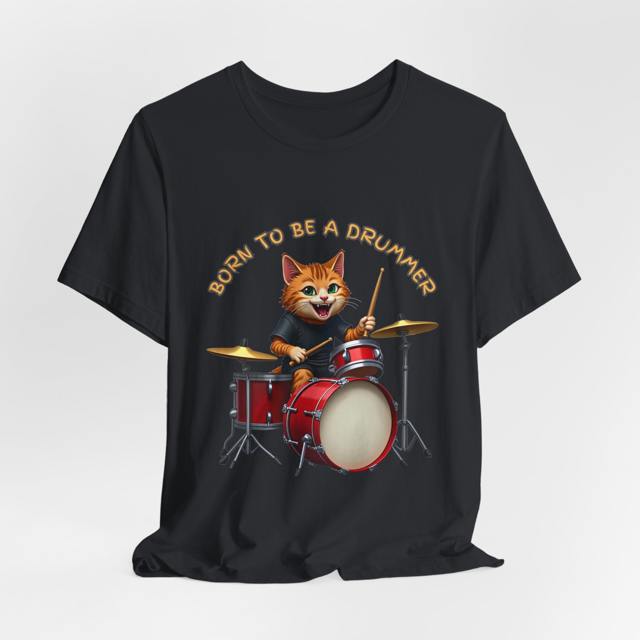 Vintage black t-shirt with a cat playing drums graphic and text 'Born to be a drummer' on a white background