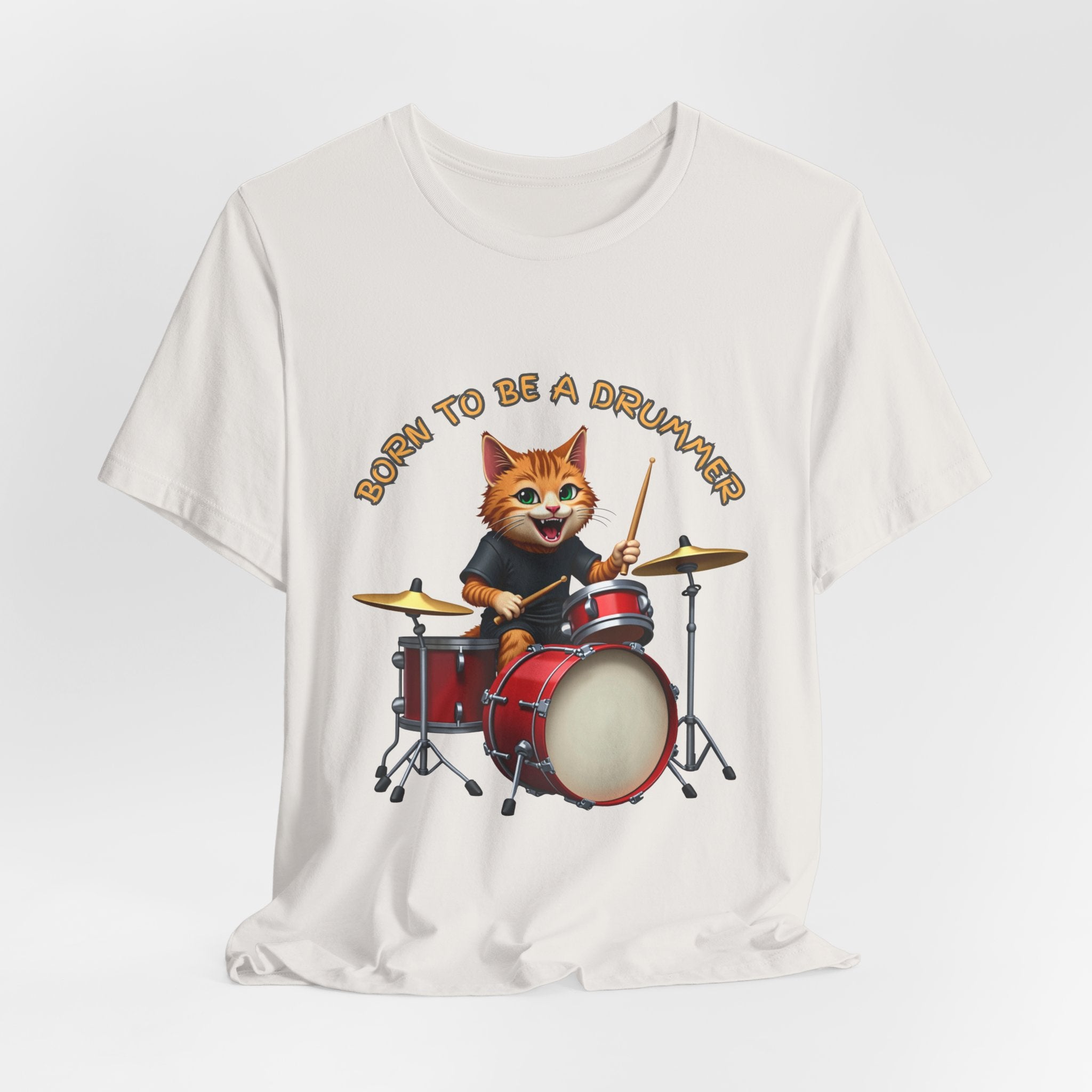 White t-shirt with a graphic of a cat playing drums and 'Born to be a Drummer' text on a white background