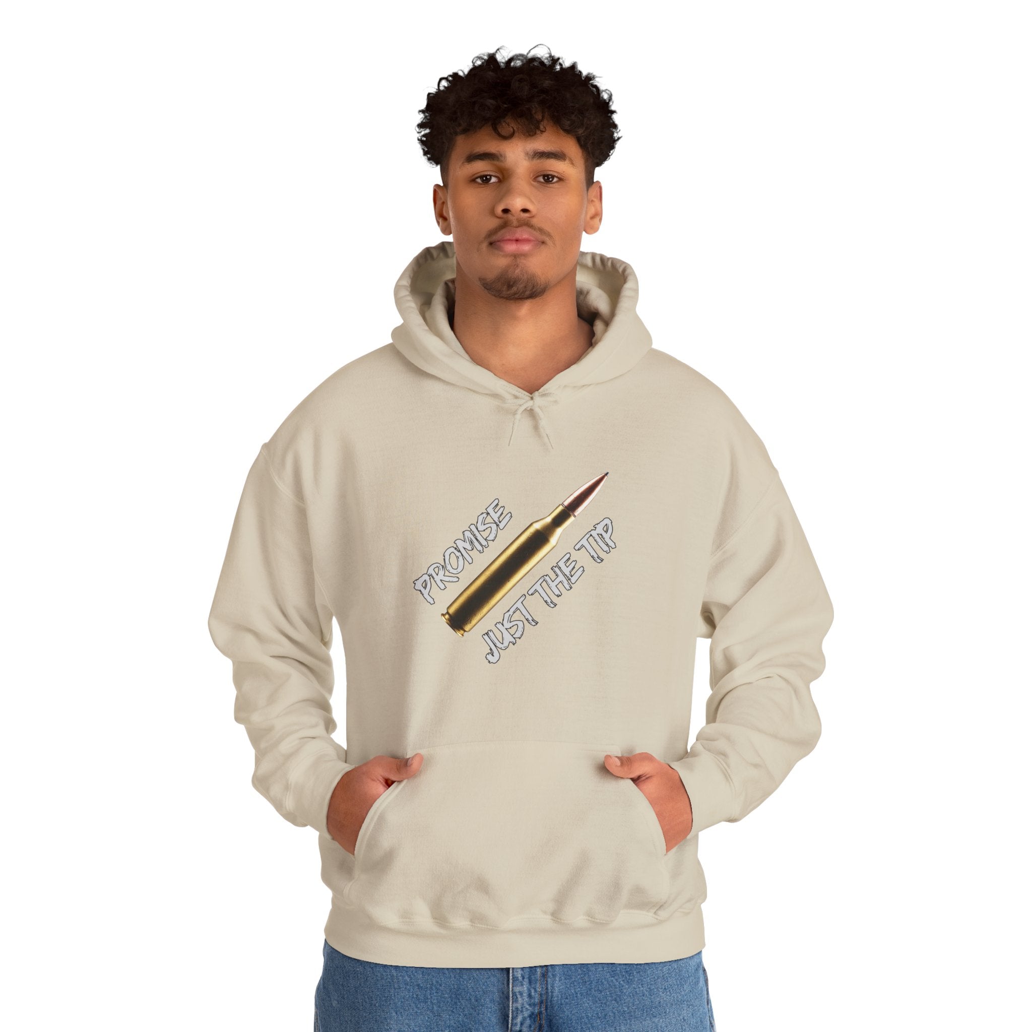 Person wearing a beige hoodie with a graphic design of M16 bullet with on a white background text "promise just the tip" on a grey background.
