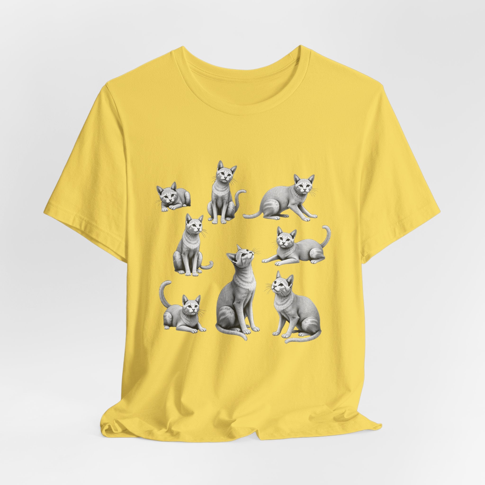 Maze yellow t-shirt with gray cat illustrations on a white background
