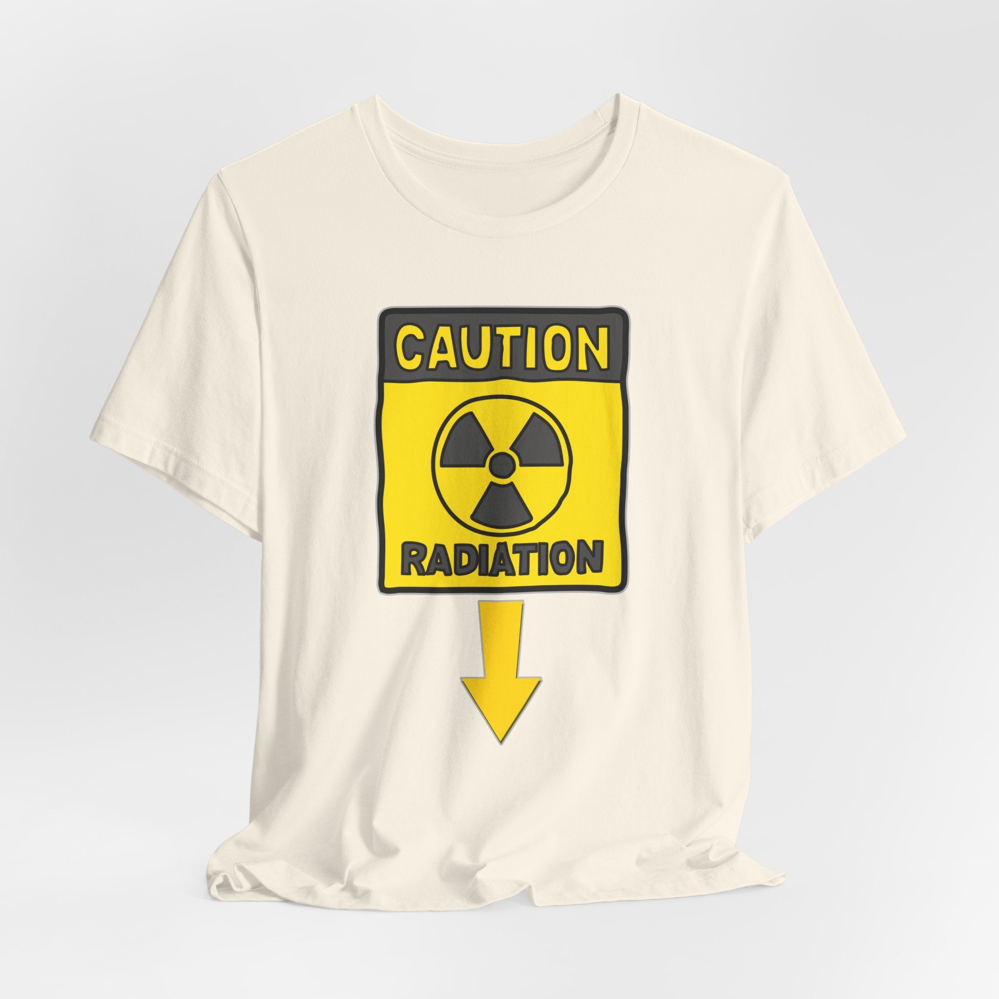 Ivory beige t-shirt with a radiation warning sign graphic on a light gray background