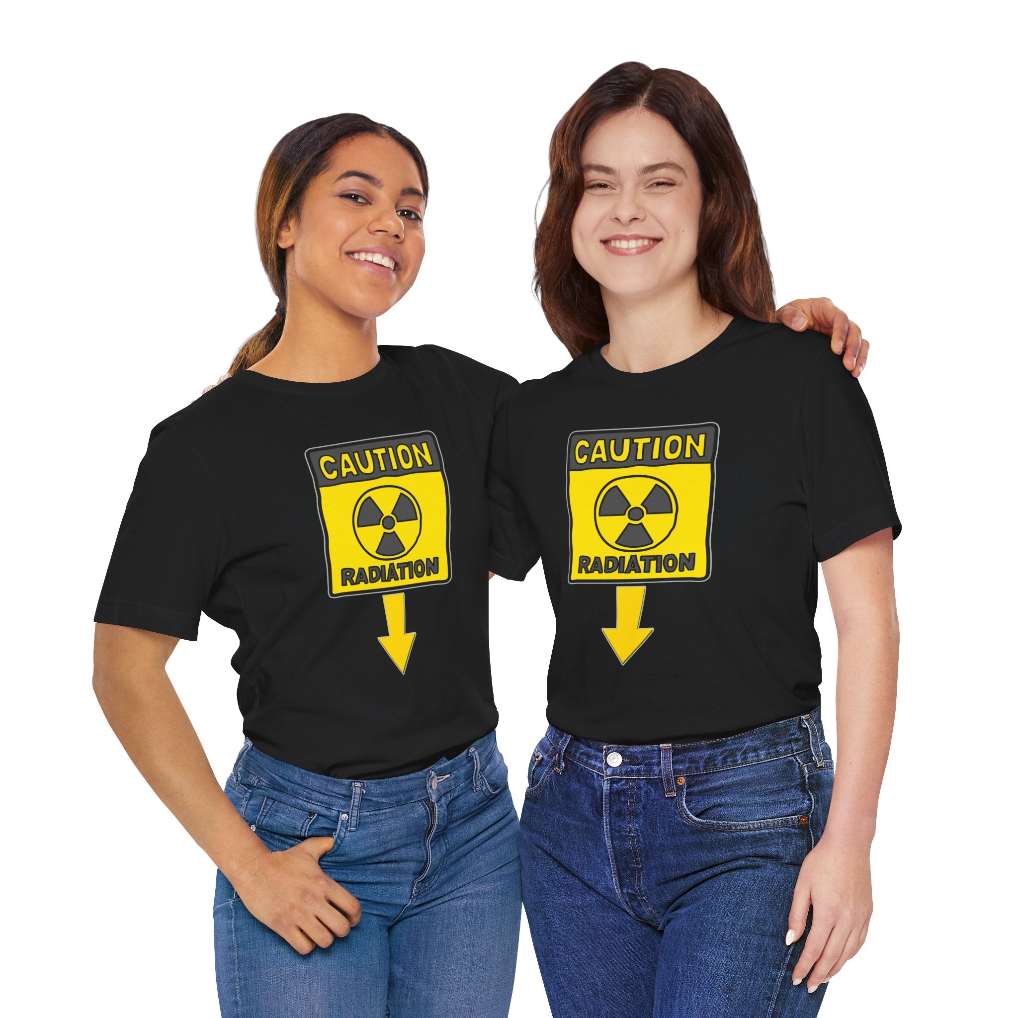 Two people wearing black t-shirts with a radiation warning symbol on a white background