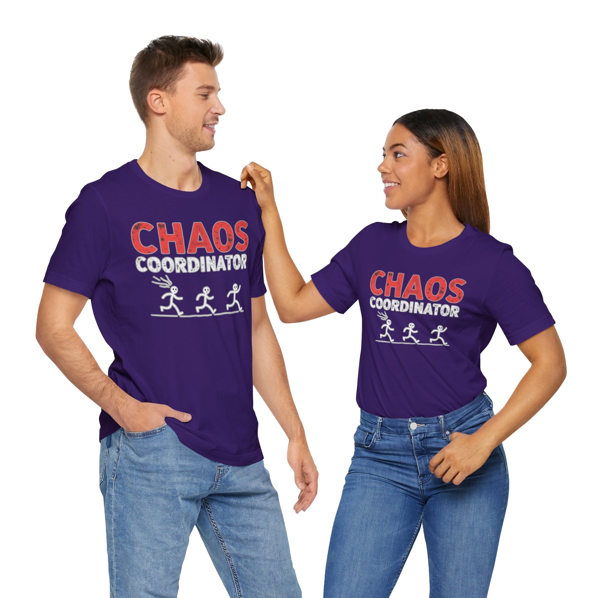 Two people wearing purple t-shirts with 'CHAOS COORDINATOR' text and graphics on a white background.