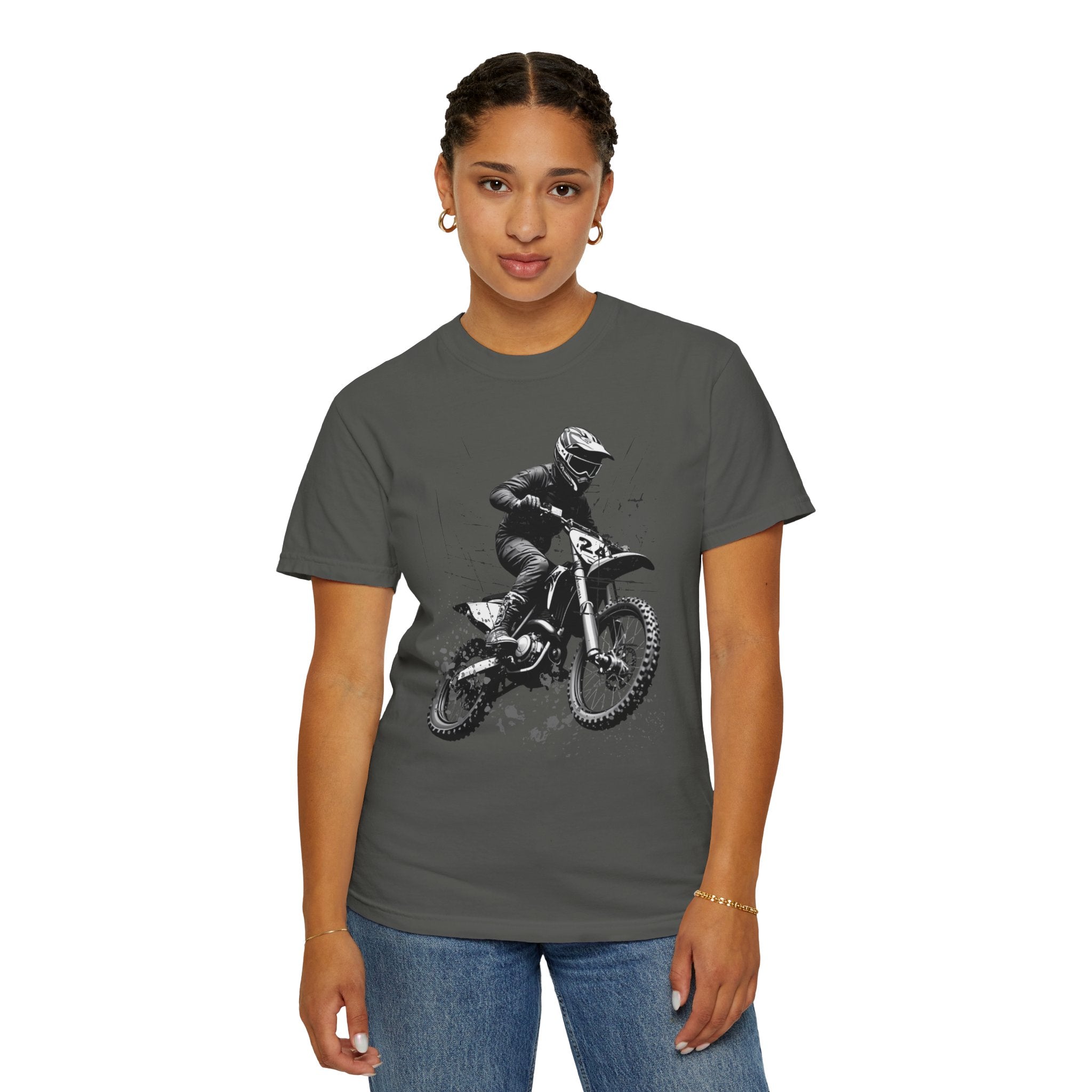 Person wearing a dark gray t-shirt with a graphic of a dirt bike rider on a white background
