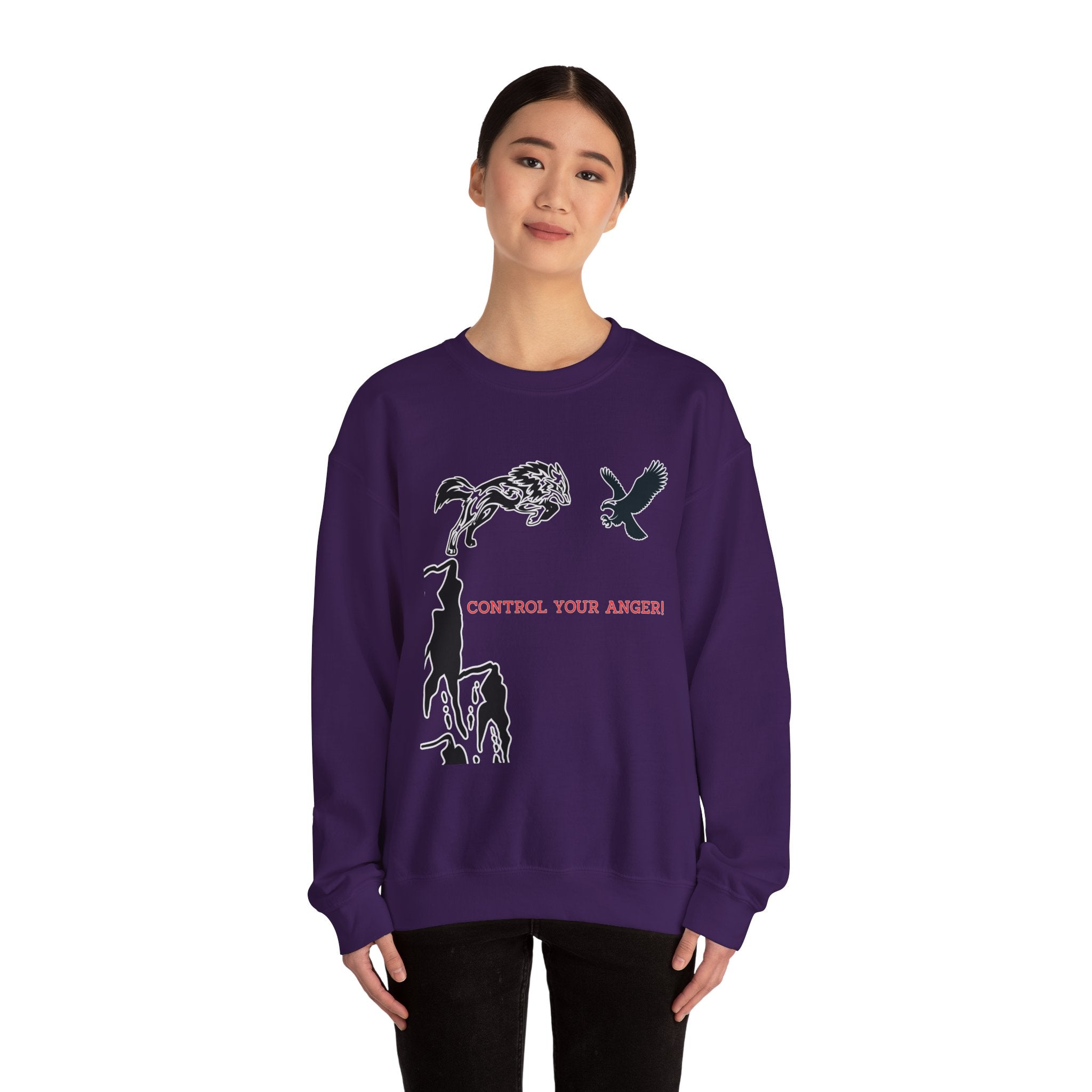 Person wearing a purple sweatshirt with animal illustrations and text on a white background