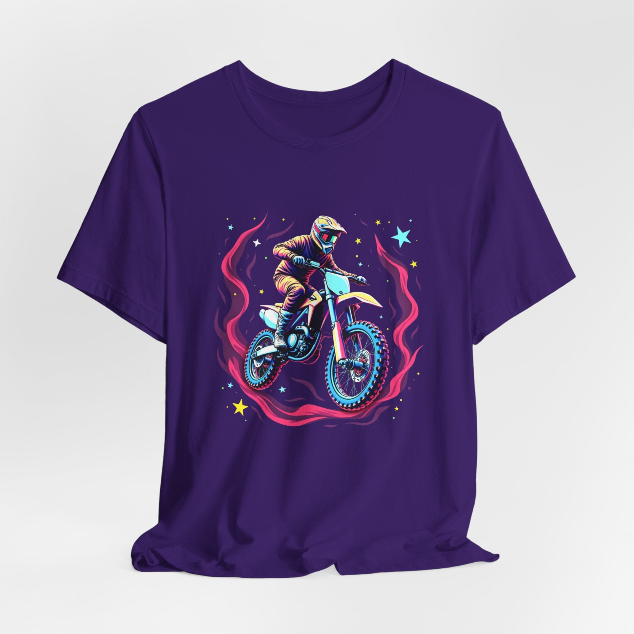 Purple t-shirt with a graphic of a person on a motorcycle and cosmic flames & stars on a white background