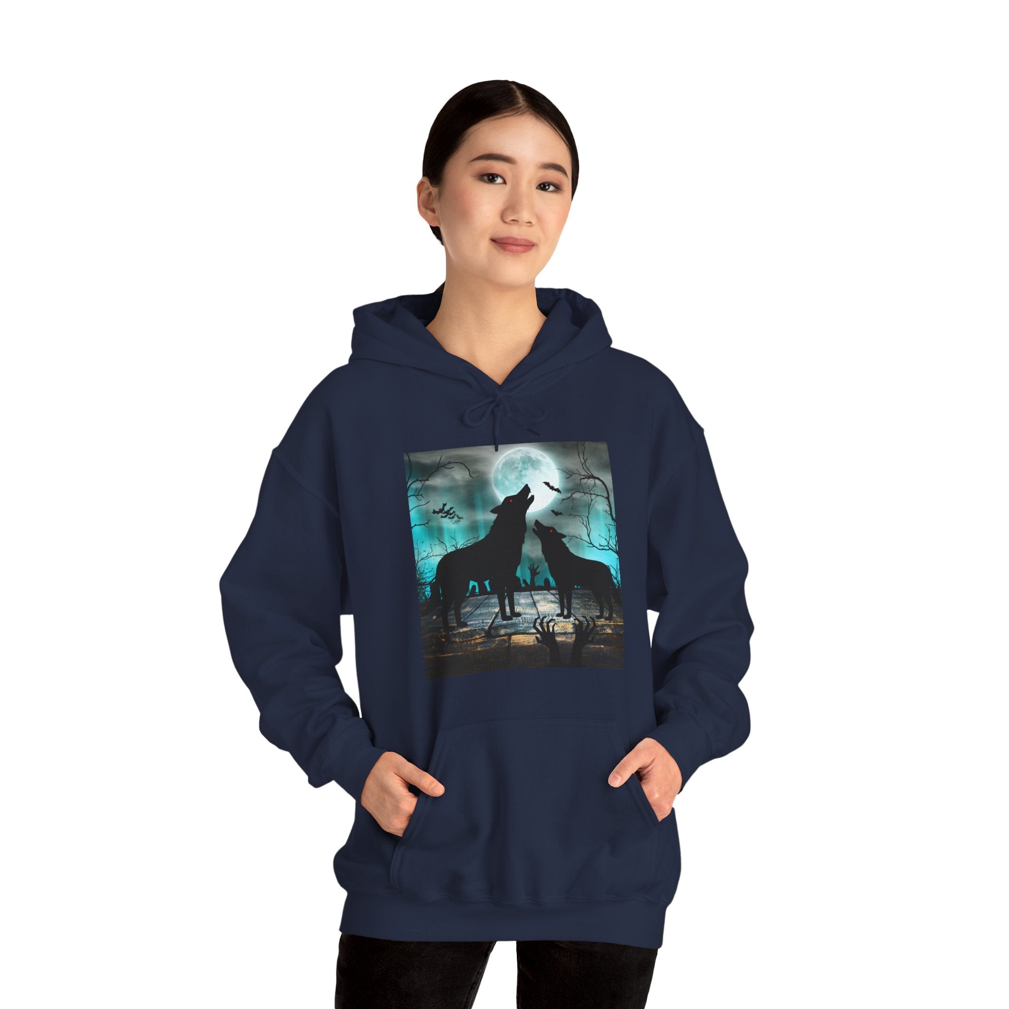 Person wearing a navy blue hoodie with a graphic of two wolves howling at the moon.