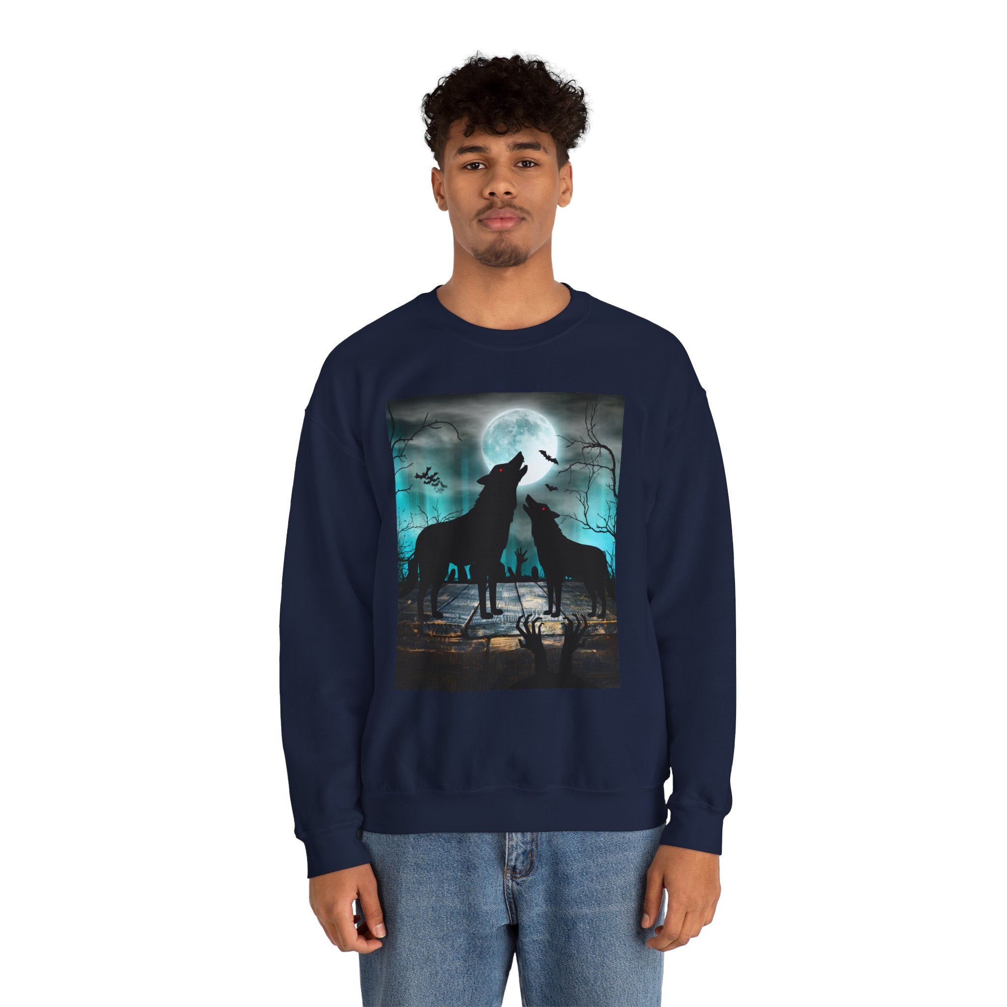 Person wearing a navy blue sweatshirt with a graphic of two wolves howling at the moon.
