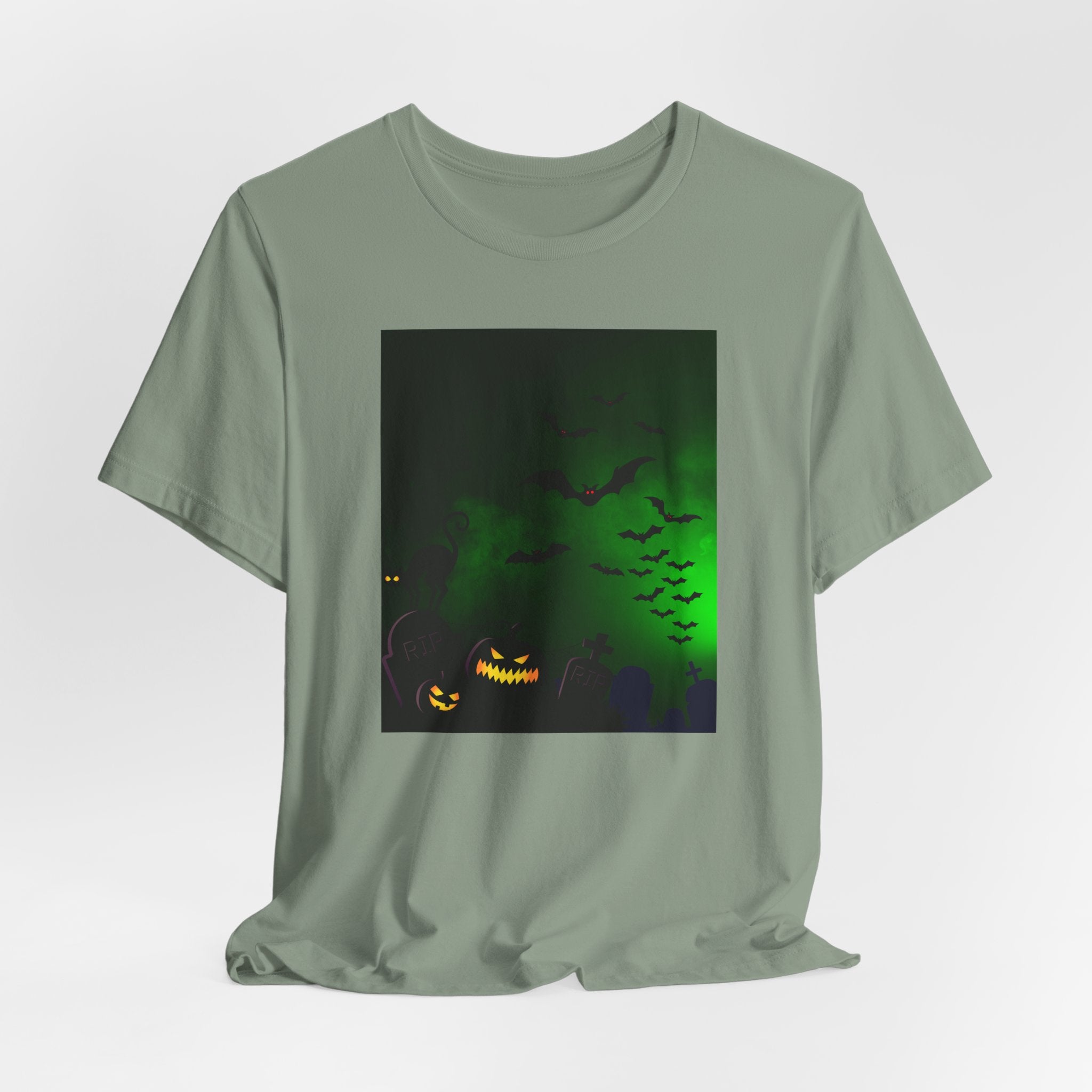 Sage green t-shirt with Halloween-themed graphic on a white background