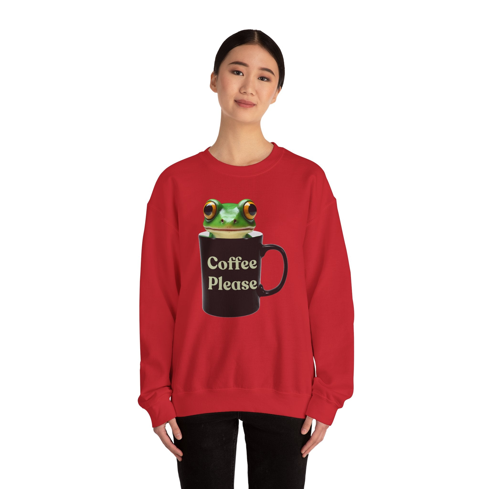 Person wearing a red sweatshirt with a frog design and 'Coffee Please' text on a white background