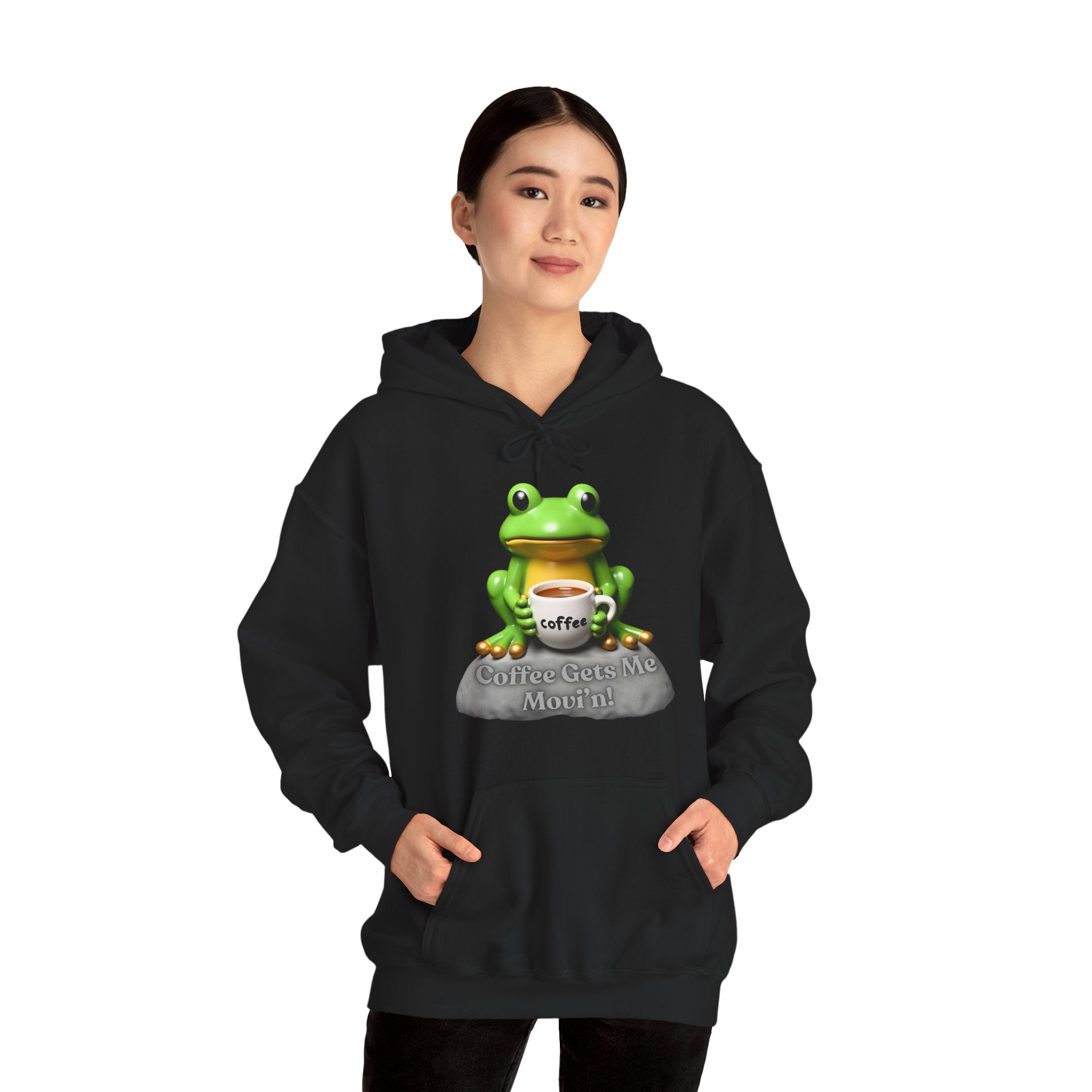 Person wearing a black hoodie with a frog graphic and text on a white background