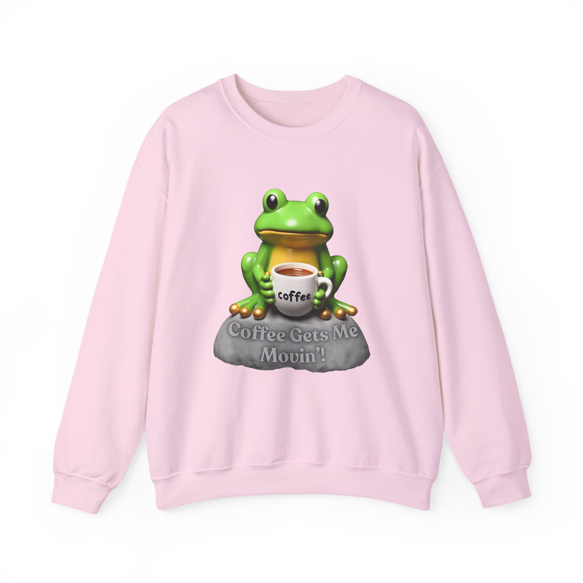 Light pink sweatshirt with a green frog holding a coffee cup and 'Coffee Gets Me Movin'' text on a white background