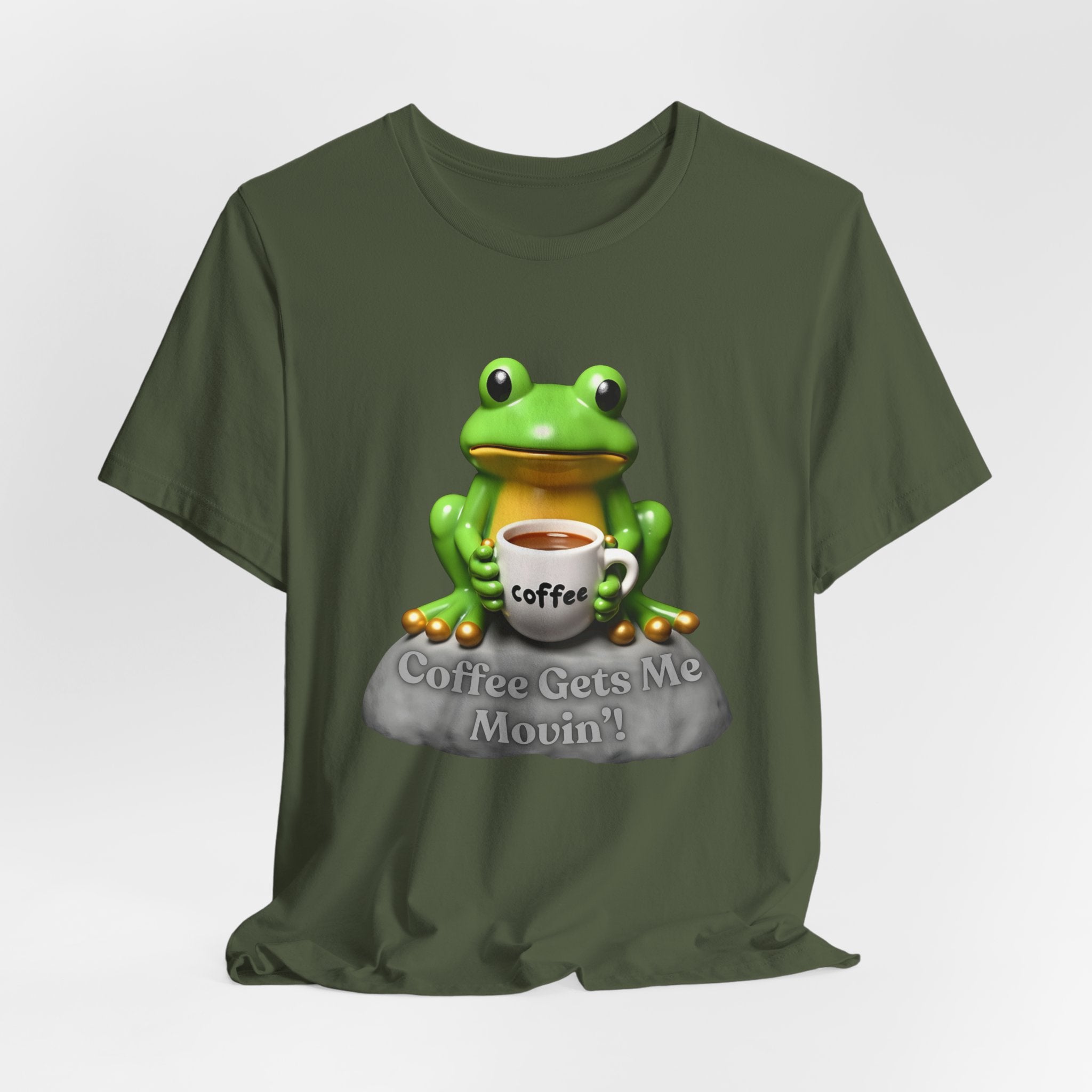 Military green t-shirt with a green frog holding a coffee cup and 'Coffee Gets Me Movin'' text on a white background