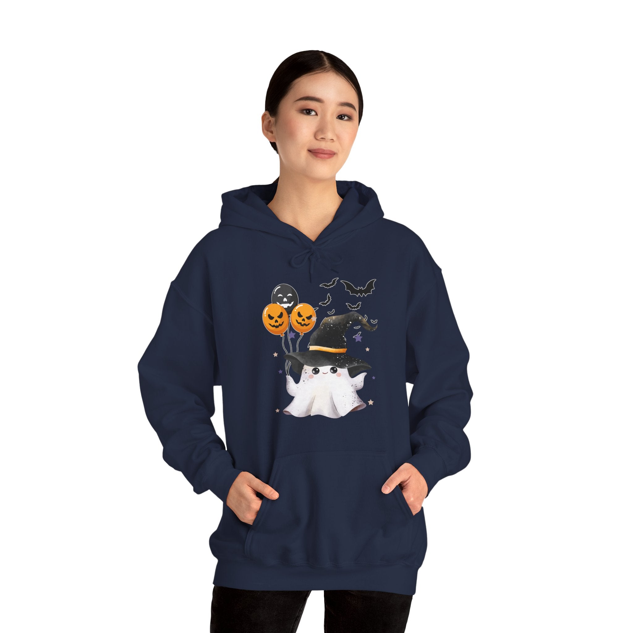 Person wearing a navy blue hoodie with Halloween-themed design on a white background