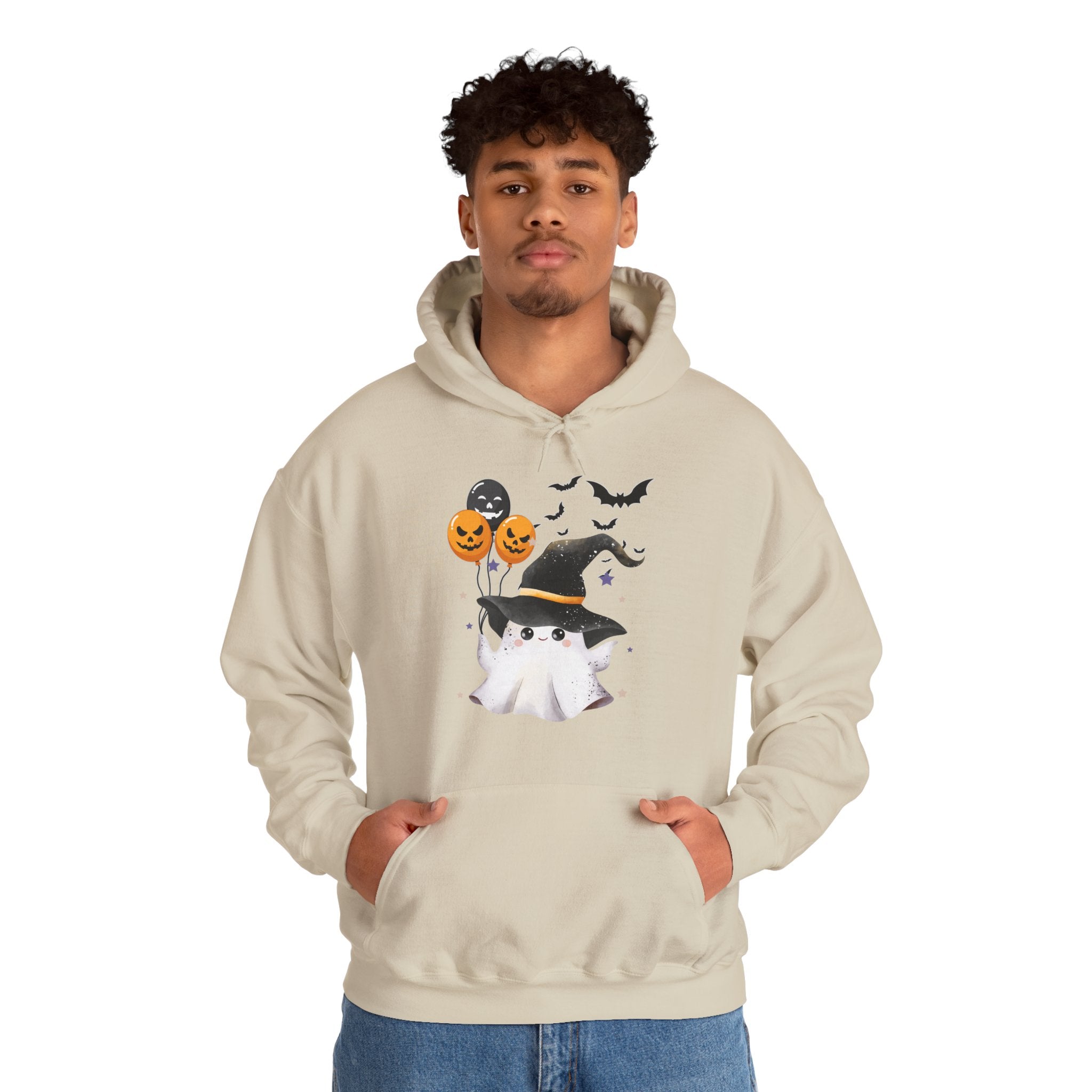 Person wearing a beige hoodie with Halloween-themed design on a white background