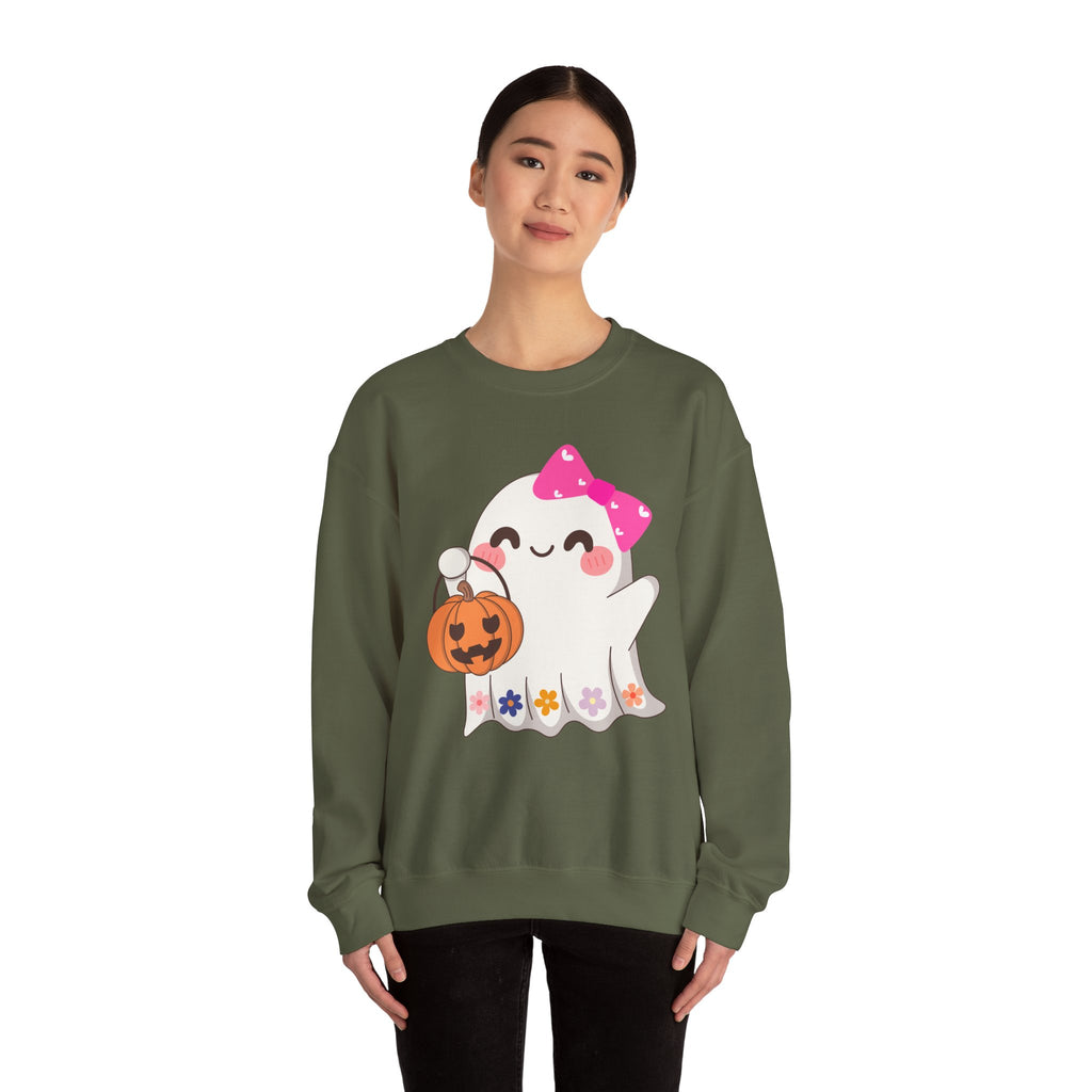 Person wearing a green sweatshirt with a cartoon ghost design on a white background