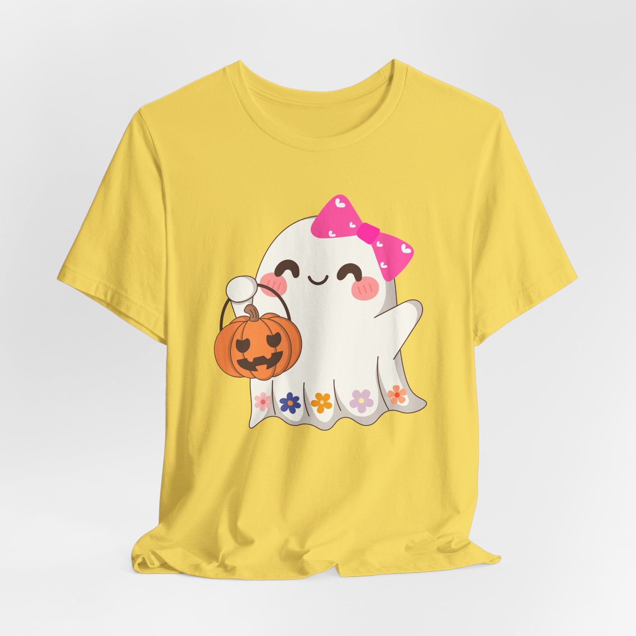 Maze yellow t-shirt with a cute Halloween ghost design holding a pumpkin on a white background