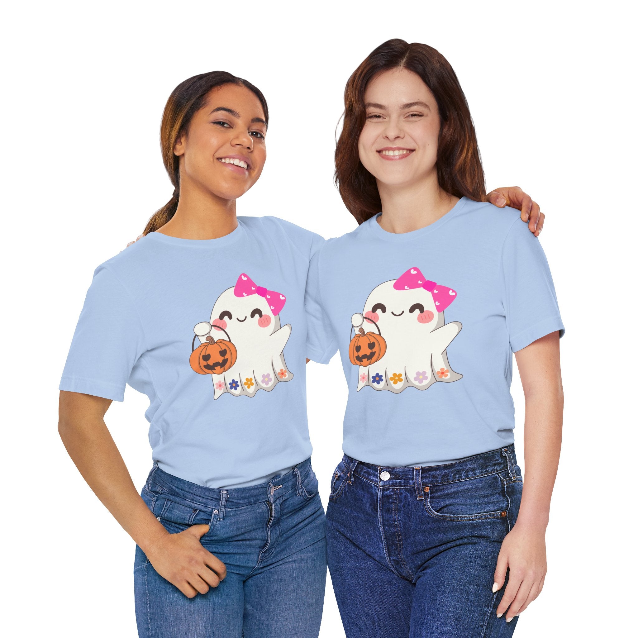 Two people wearing light blue t-shirts with cartoon ghosts and pumpkins on a white background