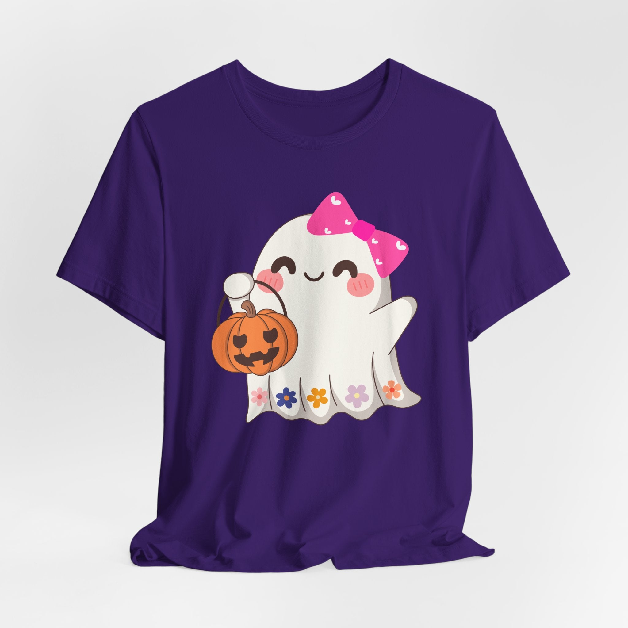 Team purple t-shirt with a cute Halloween ghost design holding a pumpkin on a white background