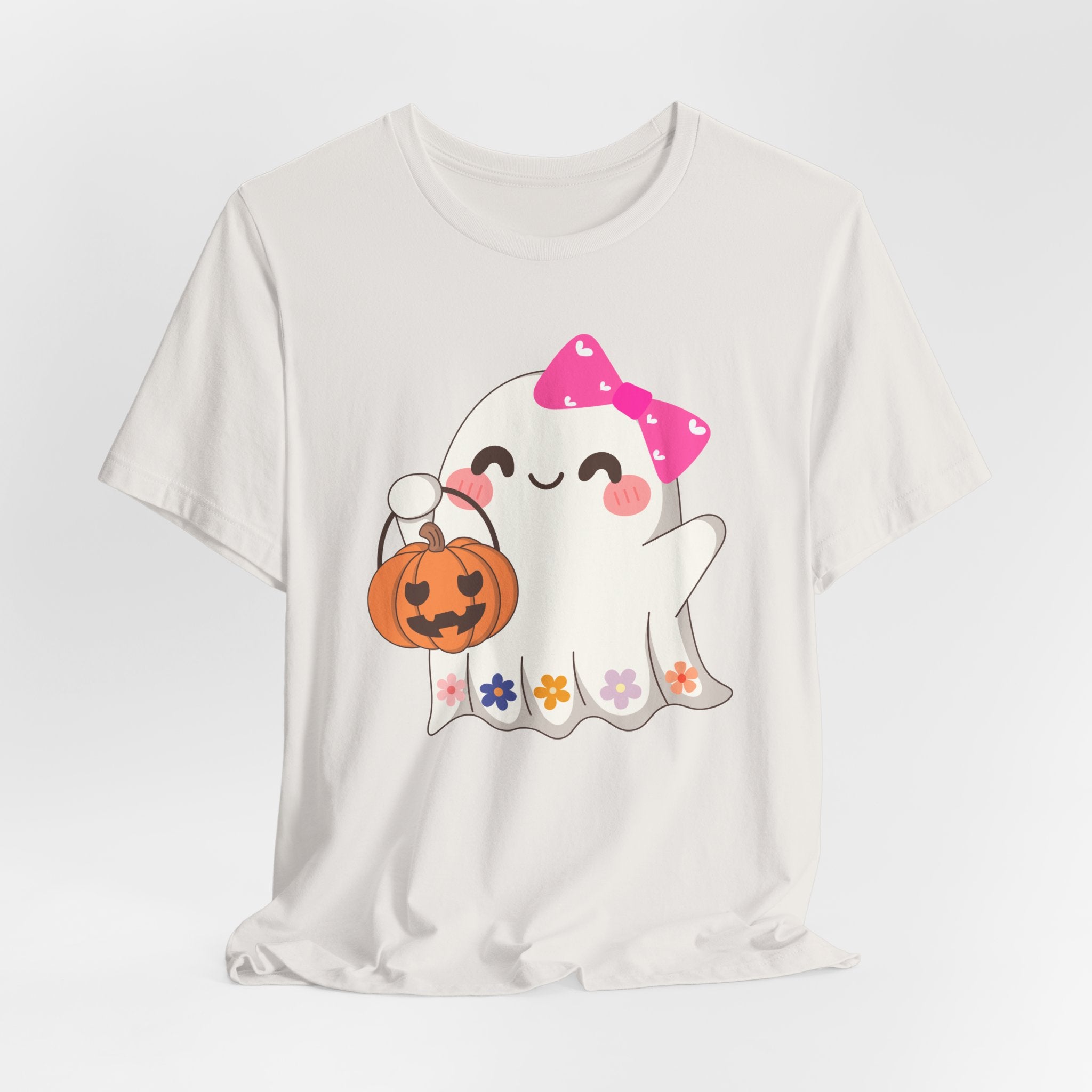 Vintage white t-shirt with a cute Halloween ghost design holding a pumpkin on a white background
