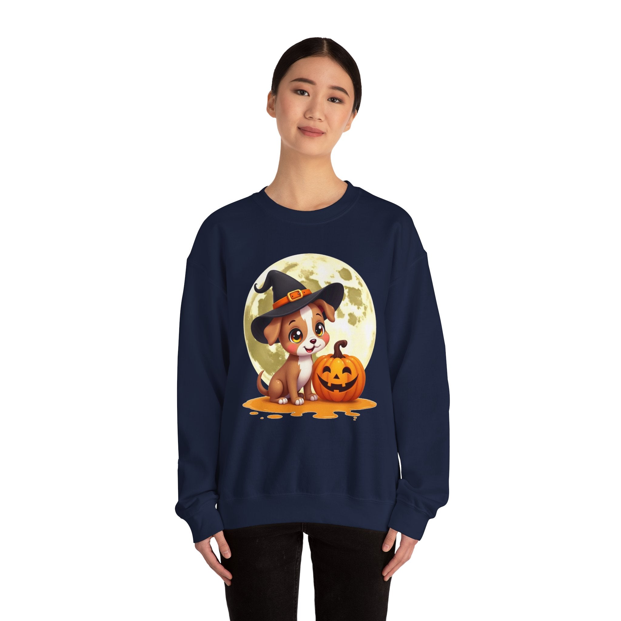 Person wearing a navy blue sweatshirt with a Halloween-themed design featuring a dog in a witch hat and pumpkin.